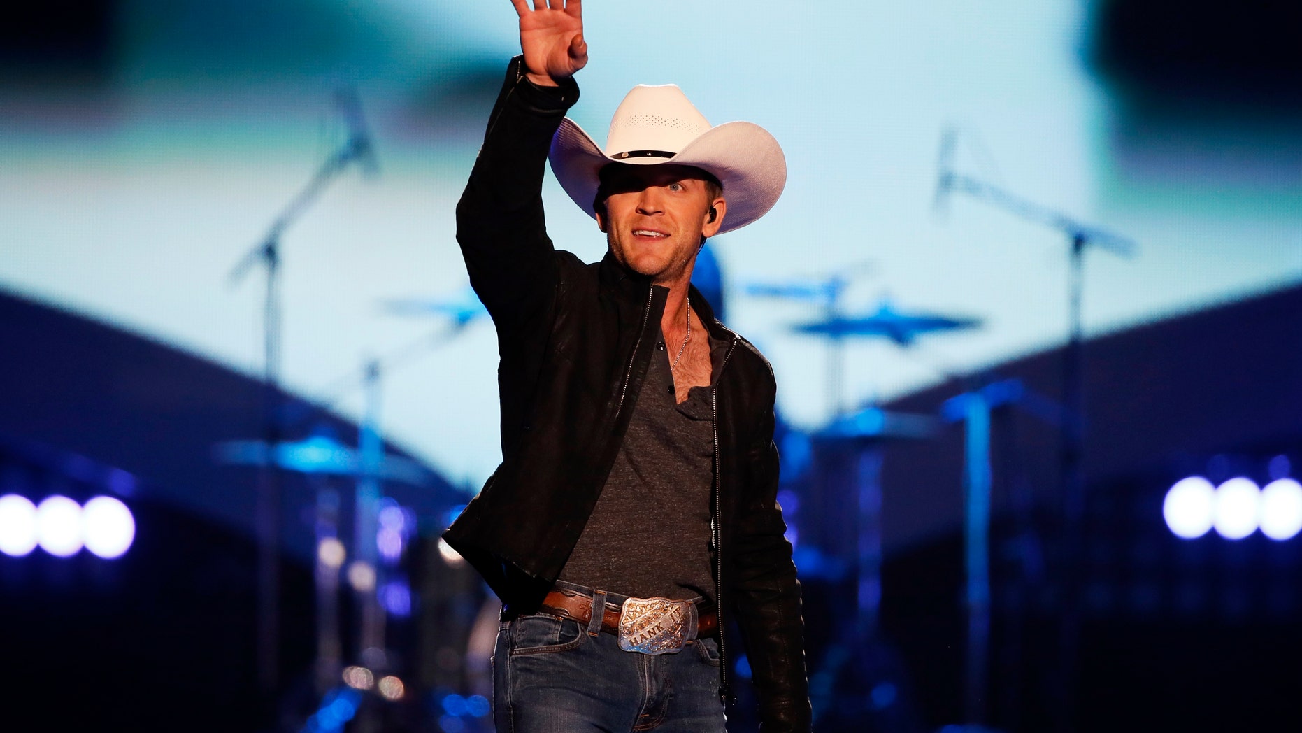 Singer Justin Moore performs "Point at You" during the 4th annual American Country Awards in Las Vegas, Nevada December 10, 2013.