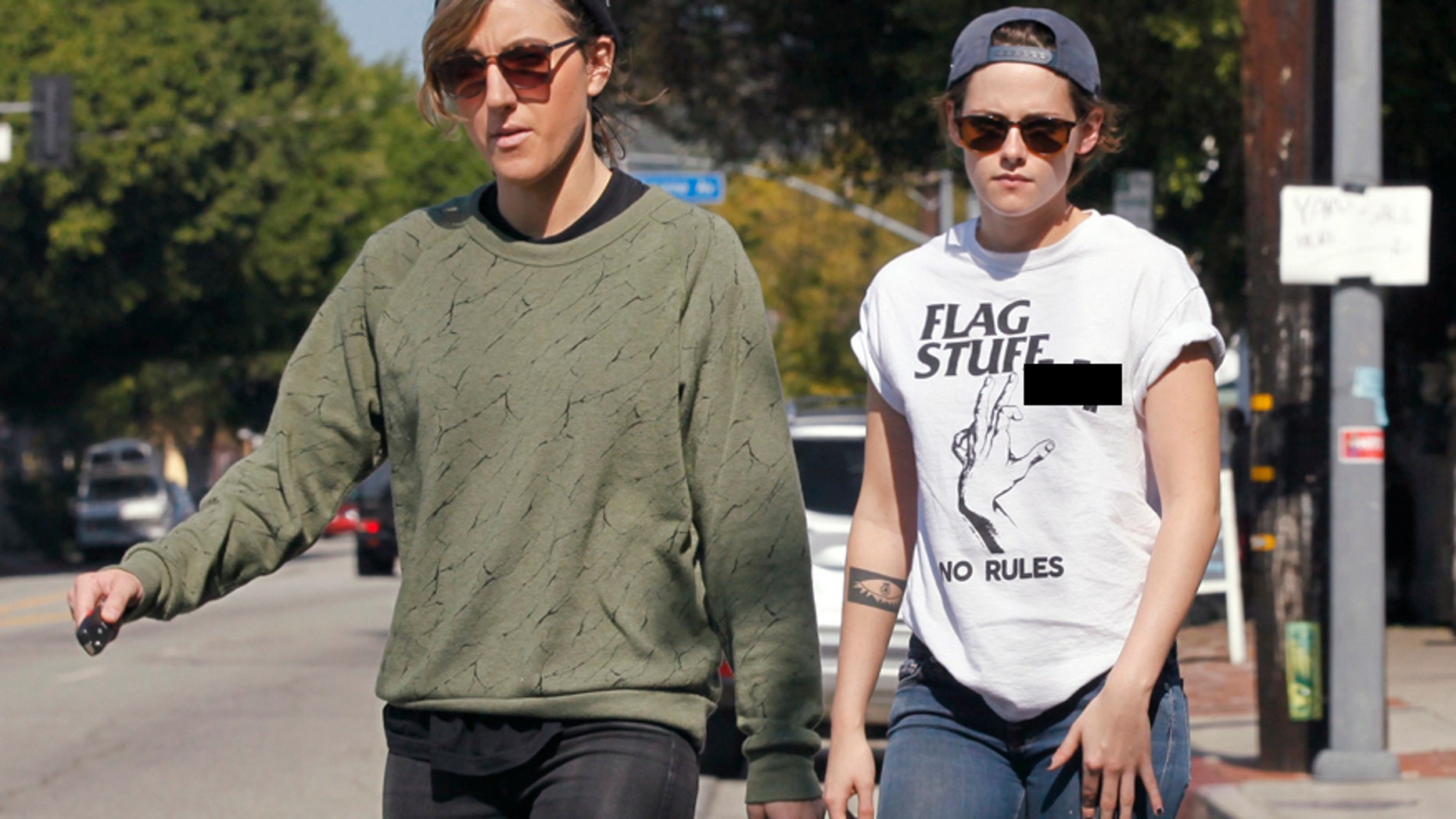 Kristen Stewart dons a shirt that says no rules while running errands in Los Feliz, Calif. with Alicia Cargile.