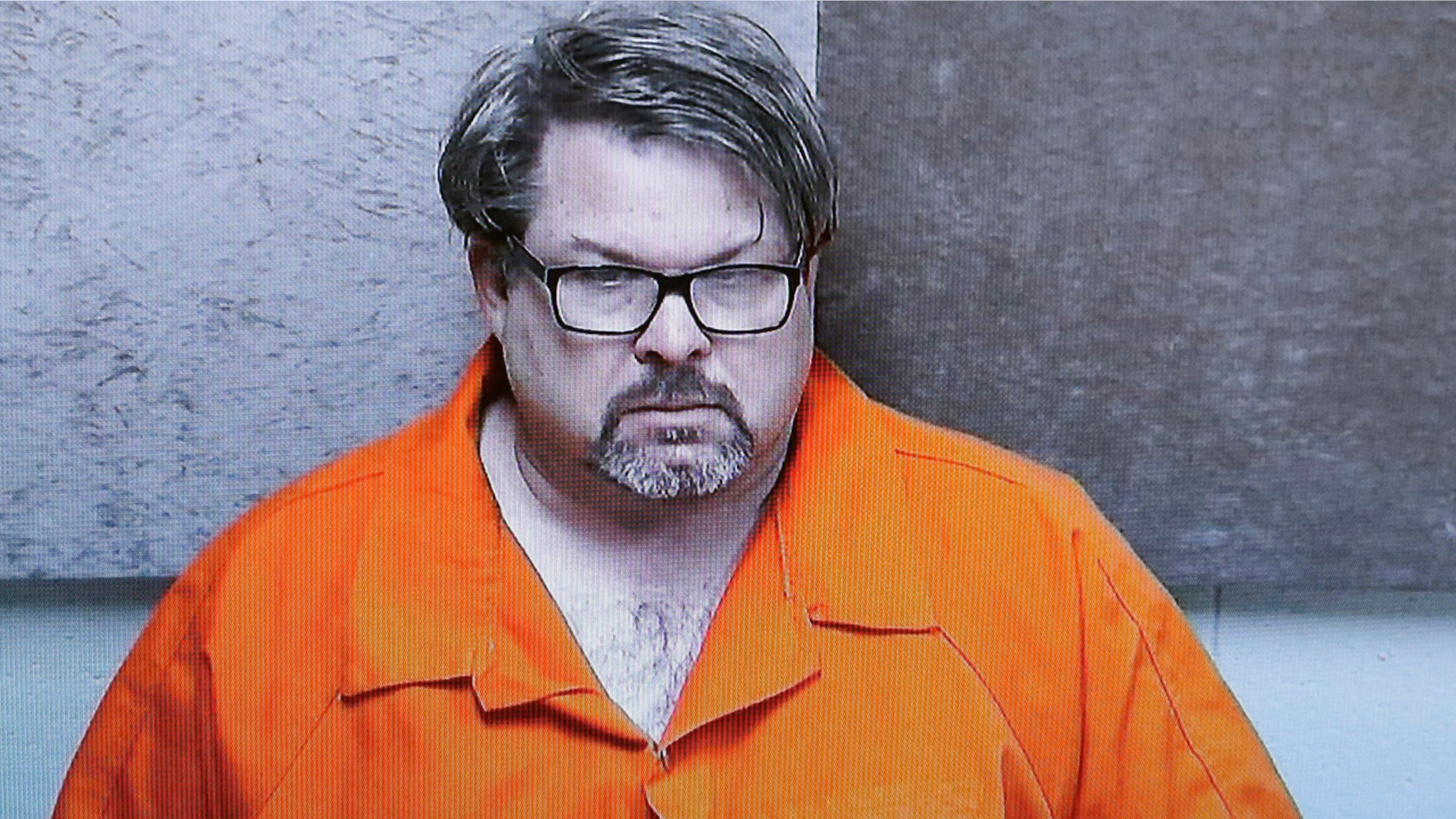 FILE - In this Feb. 22, 2016, file photo, Jason Dalton, of Kalamazoo Township, Mich., is arraigned via video before Judge Christopher T. Haenicke in Kalamazoo, Mich