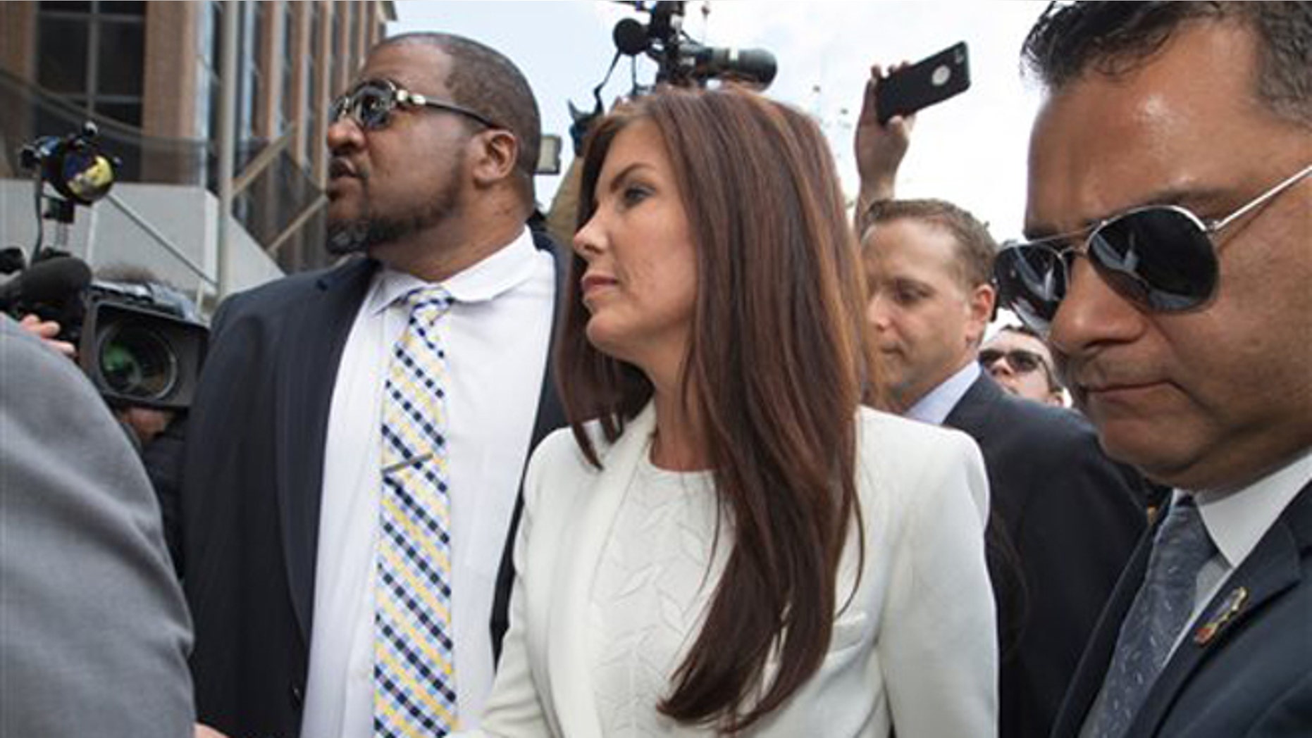 Aug. 8, 2015: Pennsylvania Attorney General Kathleen Kane arrives to be processed and arraigned on charges she leaked secret grand jury material and then lied about it under oath at the Montgomery County detective bureau in Norristown, Pa.