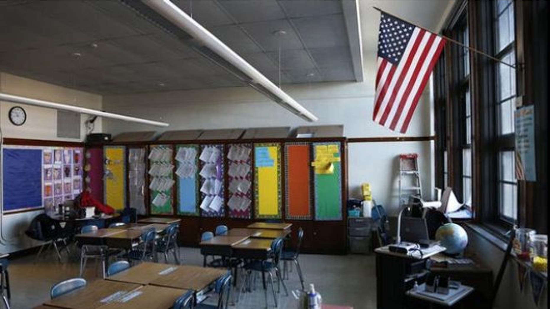 FILE: The Kansas state school board in June approved new science standards for public schools that treat both evolution and climate change as key concepts to be taught from kindergarten through the 12th grade.