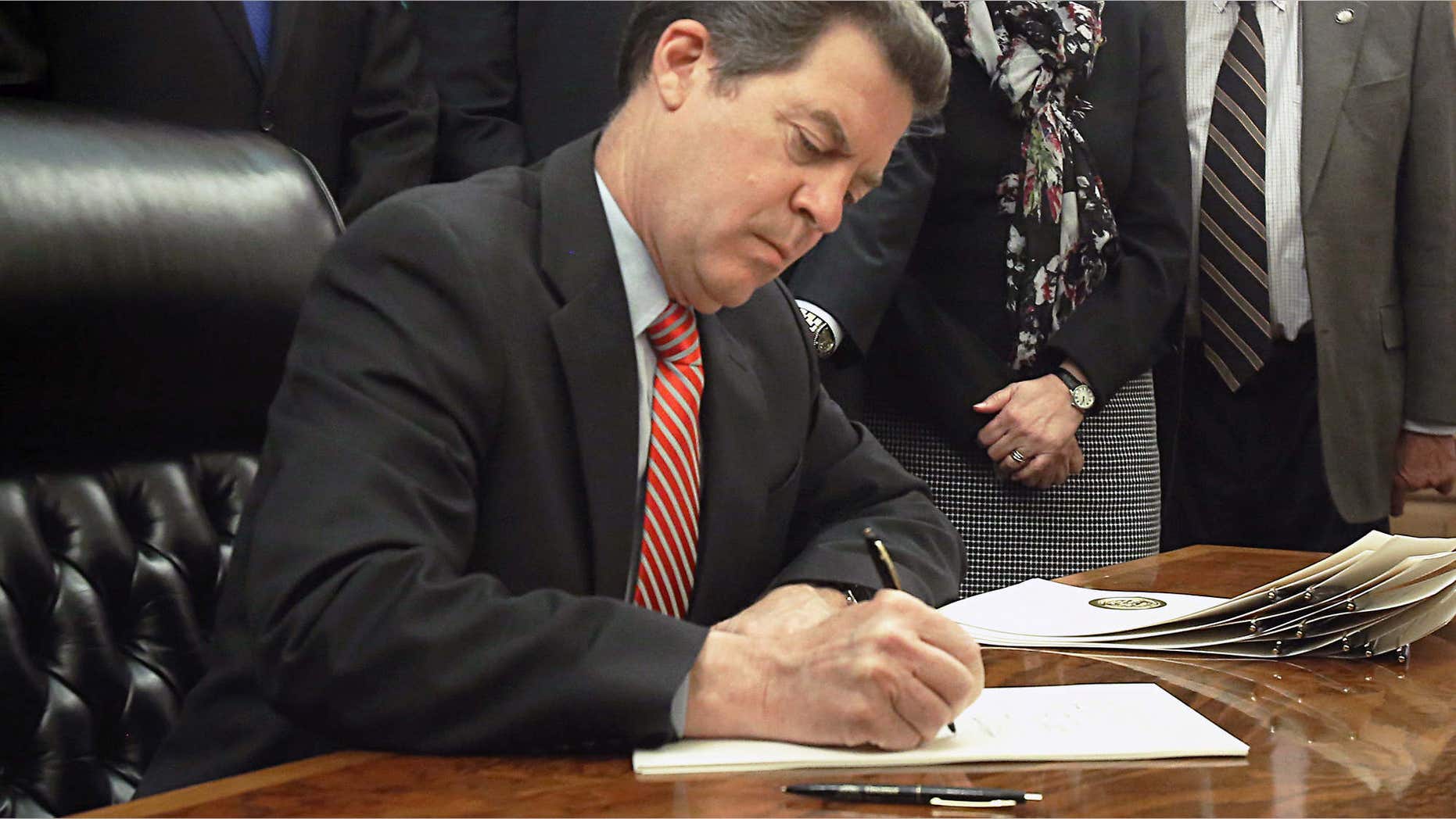 April 2, 2015: Gov. Sam Brownback signed bipartisan legislation.