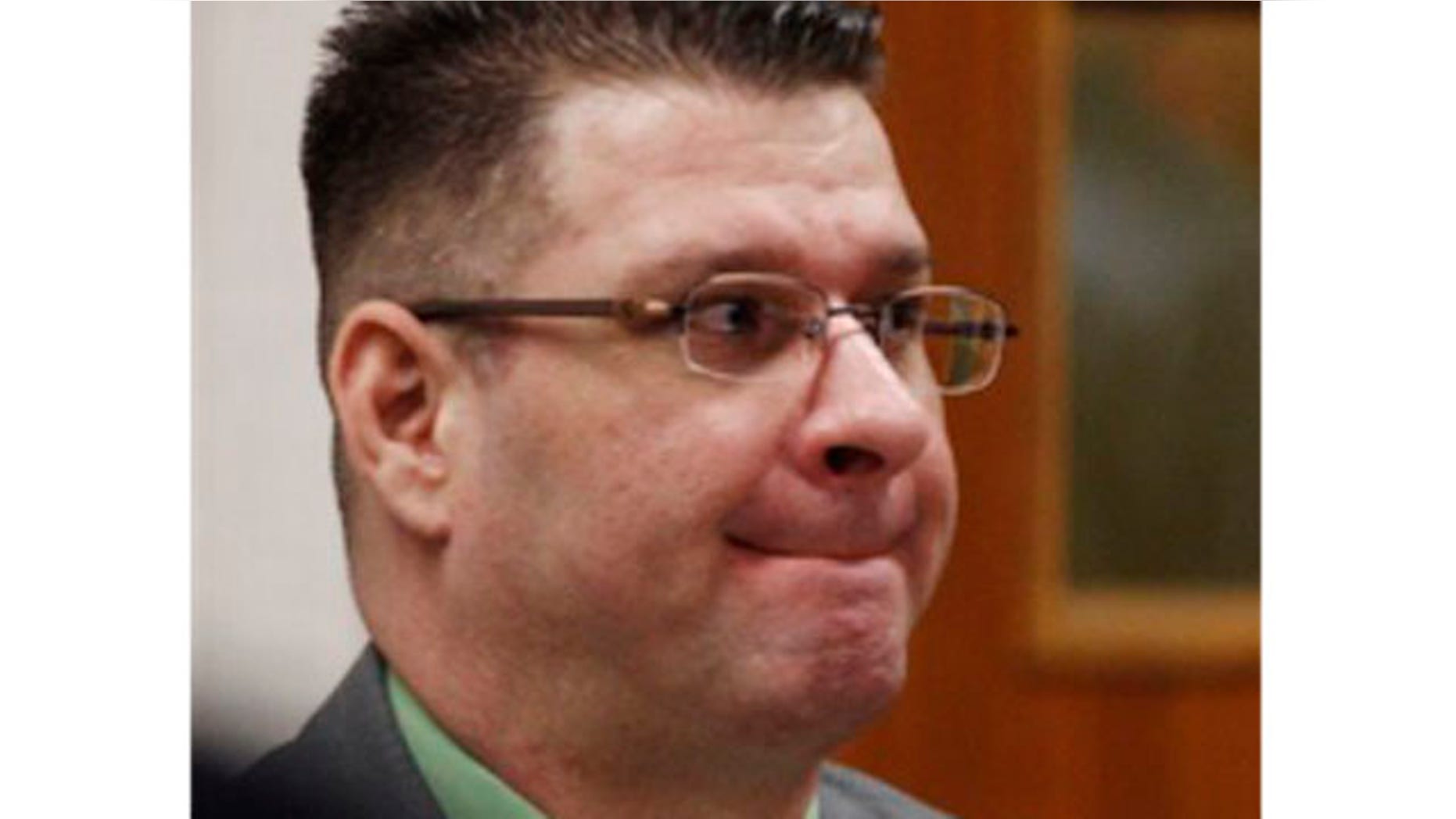 April 6, 2012: Adam Longoria watches the jury enter the courtroom during his trial in Barton County District Court in Great Bend, Kan.