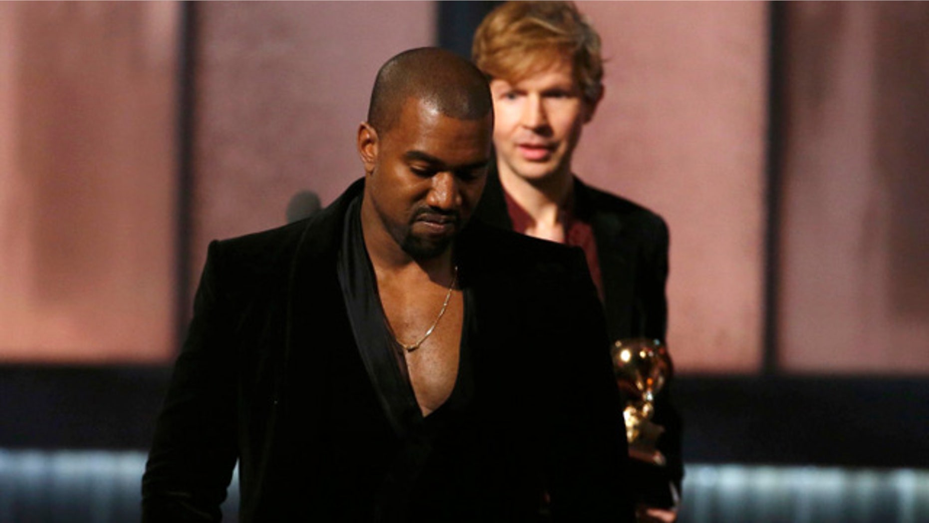 Feb. 8, 2015: Kanye West leaves the stage after pretending to take Beck's Grammy Award for album of the year at the Staples Center in Los Angeles (Reuters)