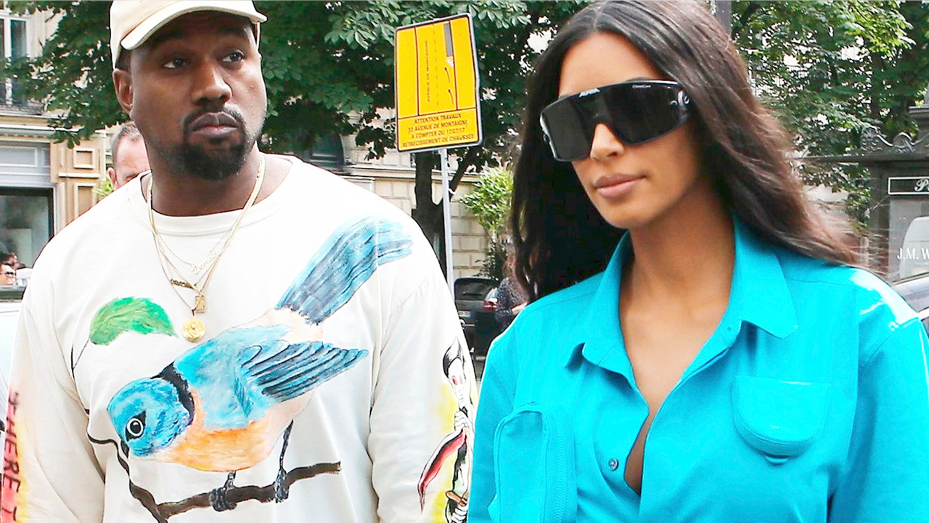 Kim Kardashian took her husband Kanye West to the ER after he reportedly came down with the flu, a new report says. The couple is pictured here in Paris.