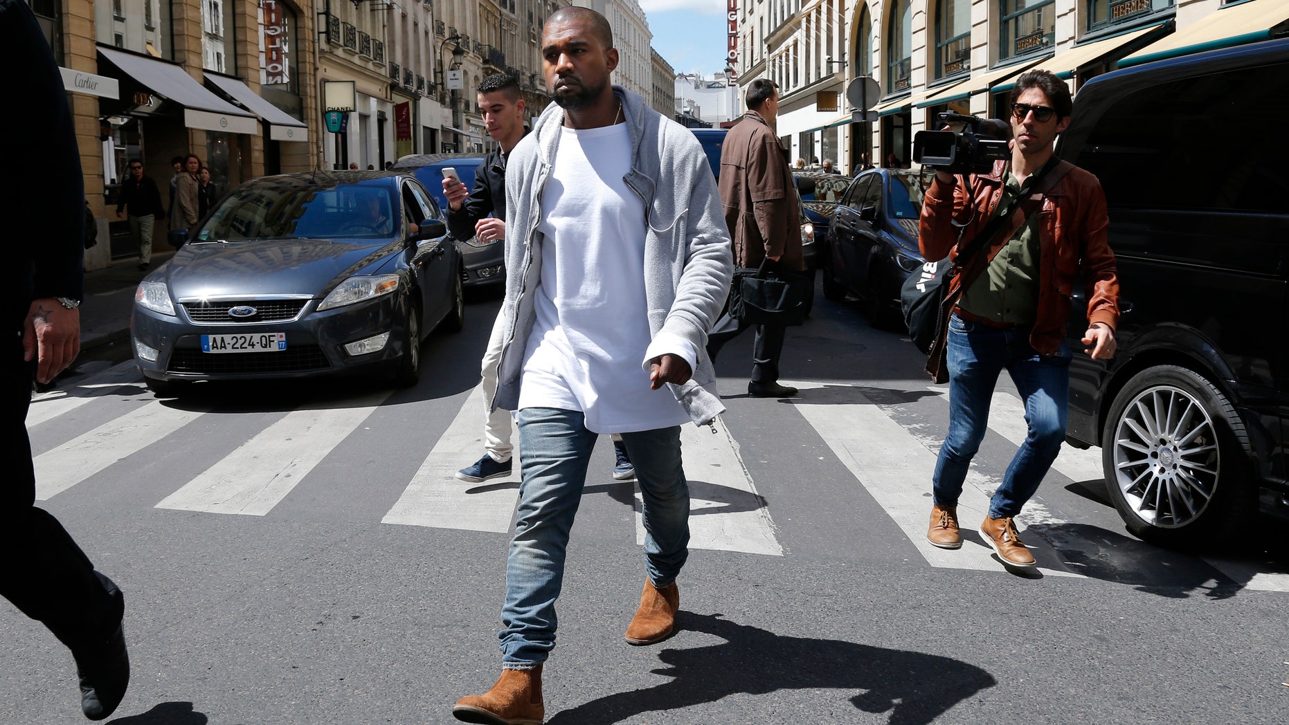May 22, 2014. Rapper Kanye West arrives at a fashion designer shop in Paris.