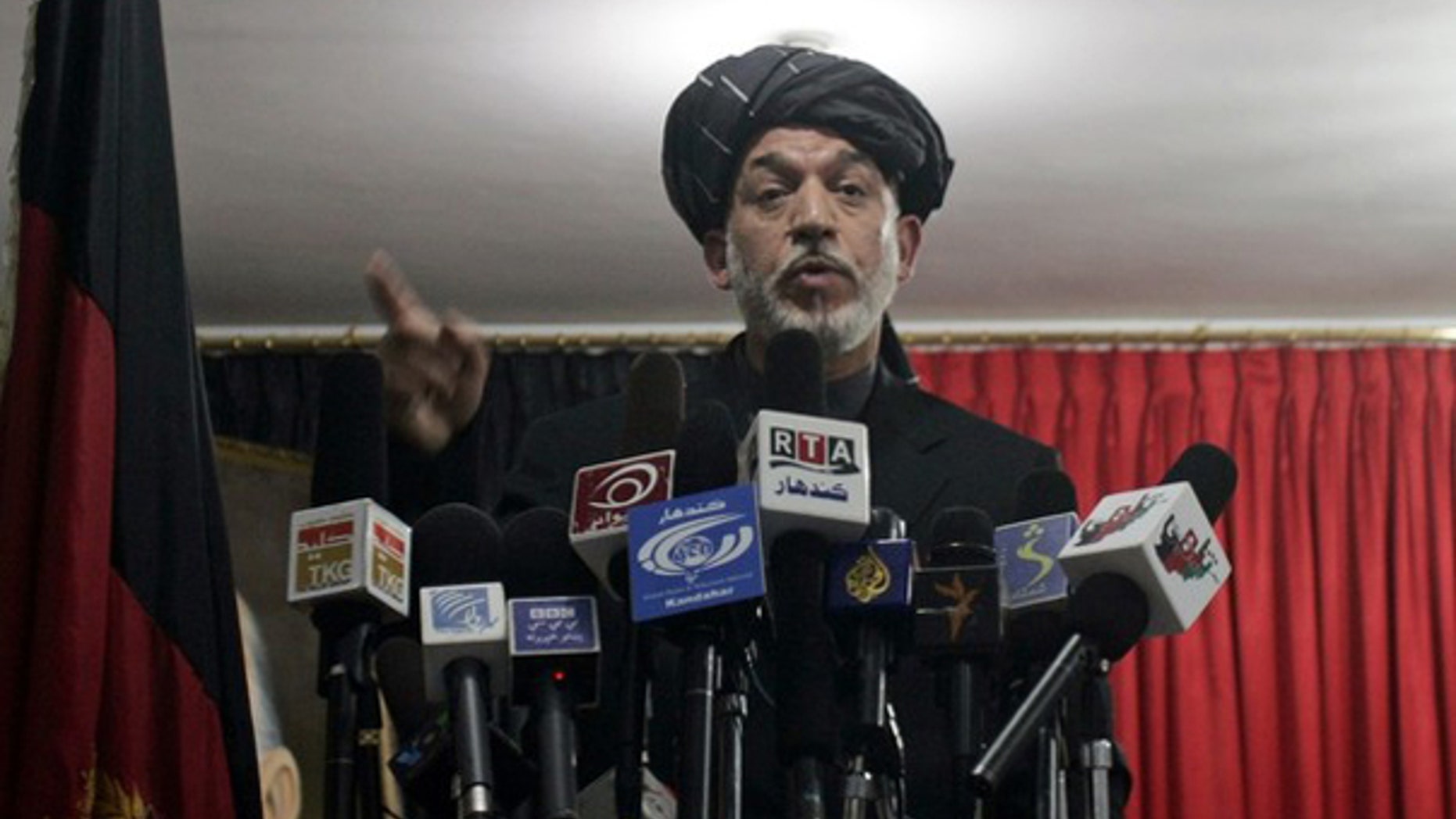 Afghan President Hamid Karzai speaks at a meeting in Kandahar April 4. (Reuters Photo)
