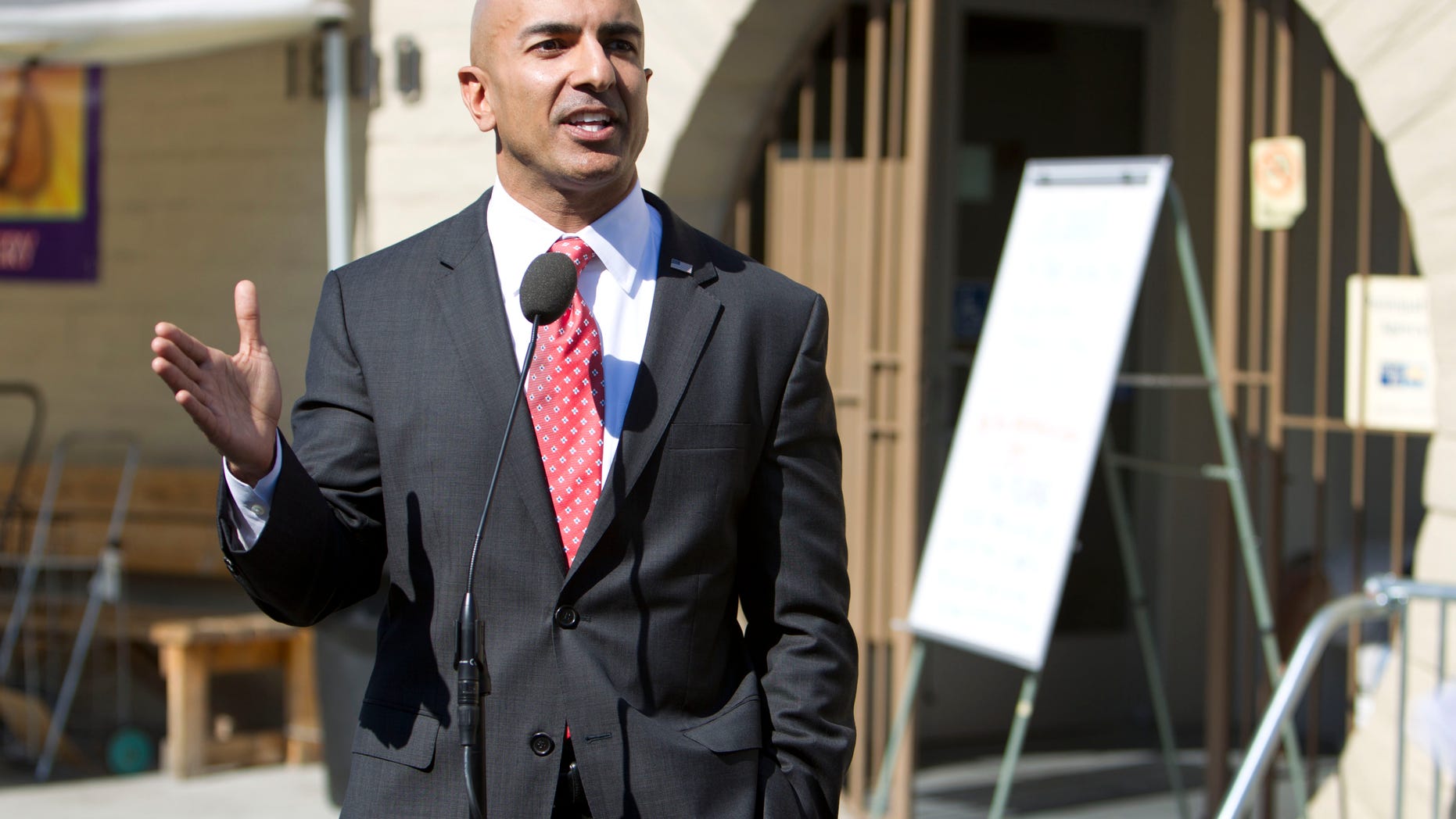 July 31, 2014: Republican candidate for governor Neel Kashkari discusses issues related to poverty in California during a news conference outside of the River City Food Bank in Sacramento, Calif.