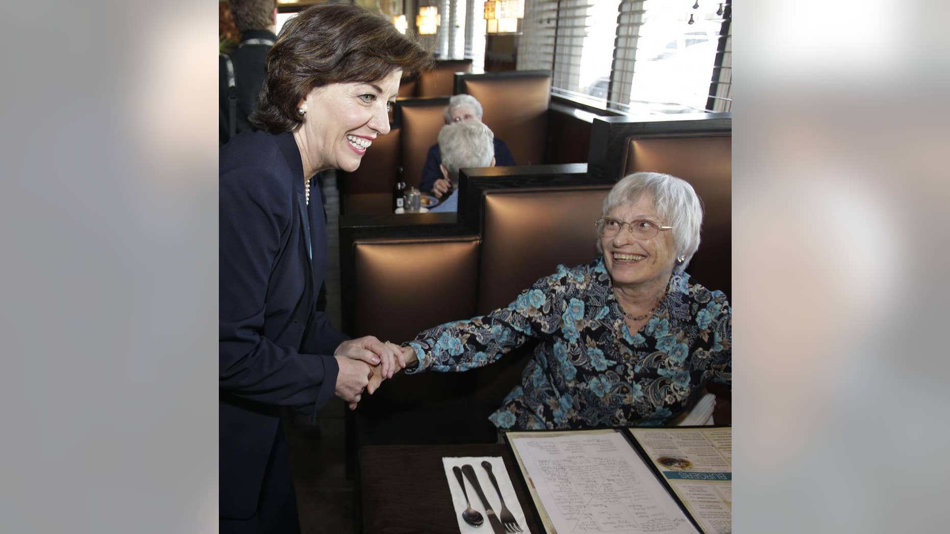 Congresswoman-elect Kathy Hochul, D-NY, left, thanks customers for their support at a restaurant in Depew, N.Y., Wednesday, May 25, 2011. (AP Photo/David Duprey)
