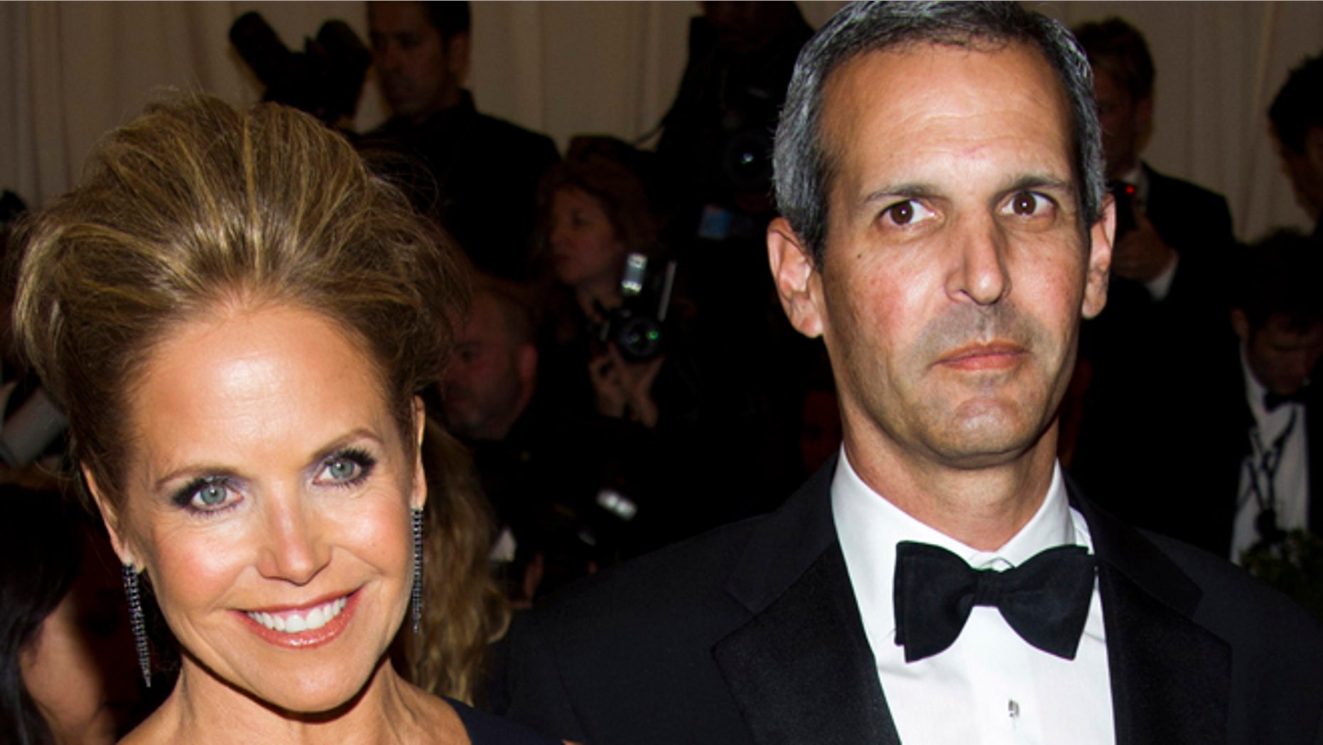 May 6, 2013: In this file photo, TV personality Katie Couric, left, and John Molner attend The Metropolitan Museum of Art's Costume Institute benefit celebrating "PUNK: Chaos to Couture" in New York. Couric has married Molner in a small ceremony at her East Hampton home.