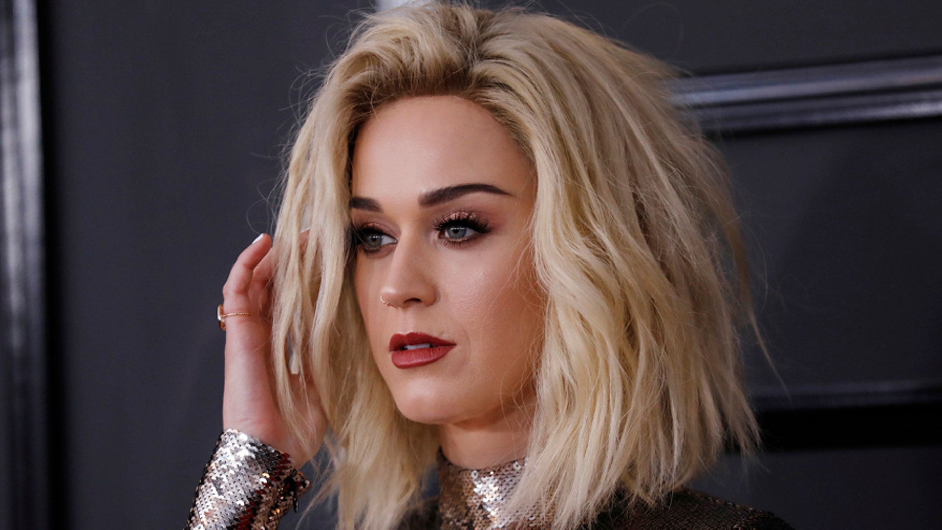 Katy Perry arrives at the 59th Annual Grammy Awards in Los Angeles.