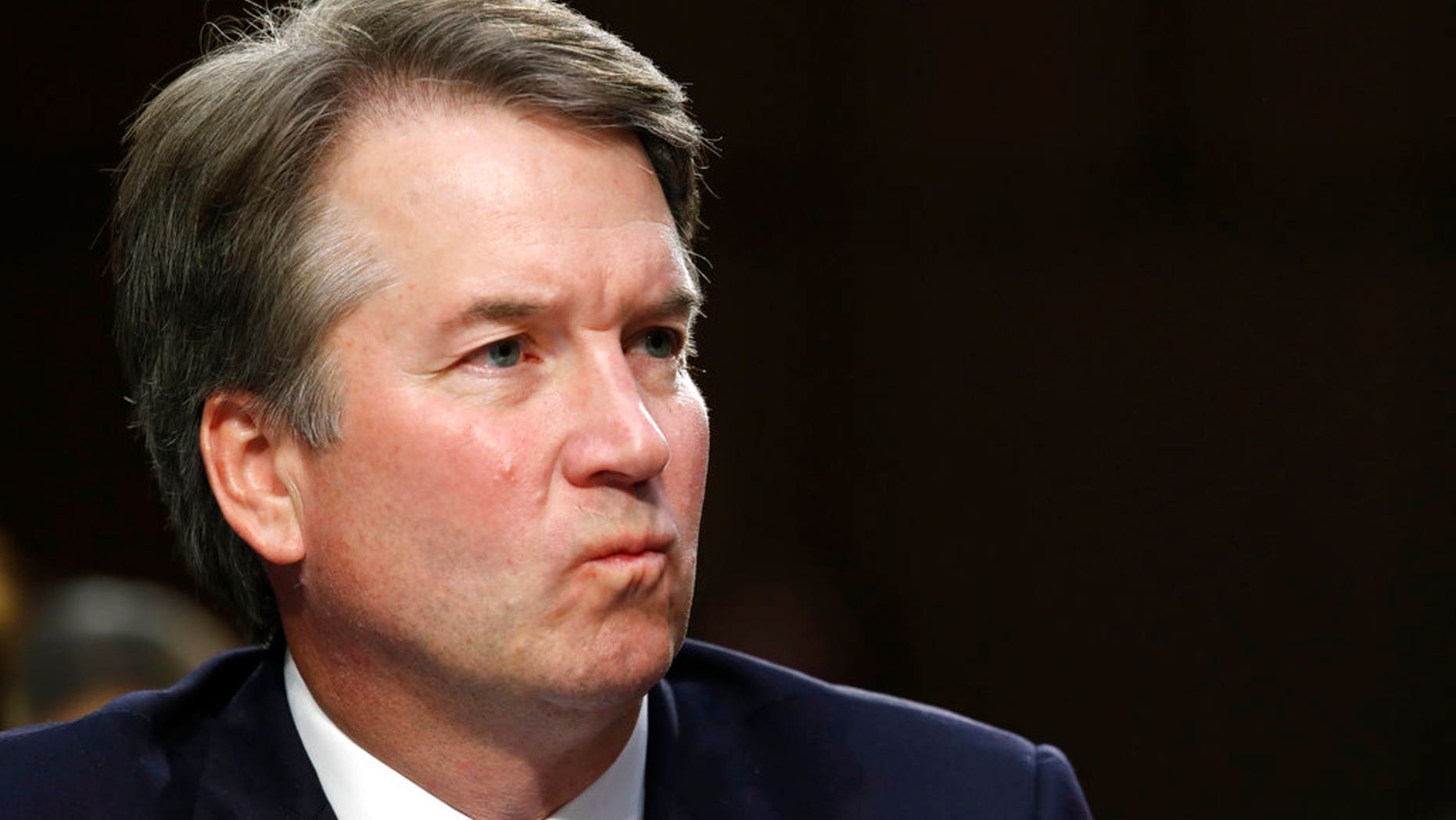 President Donald Trump's Supreme Court nominee, Brett Kavanaugh, listens to a question during the third round of questioning on the third day of his Senate Judiciary Committee confirmation hearing, Thursday, Sept. 6, 2018, on Capitol Hill in Washington, to replace retired Justice Anthony Kennedy. (AP Photo/Jacquelyn Martin)