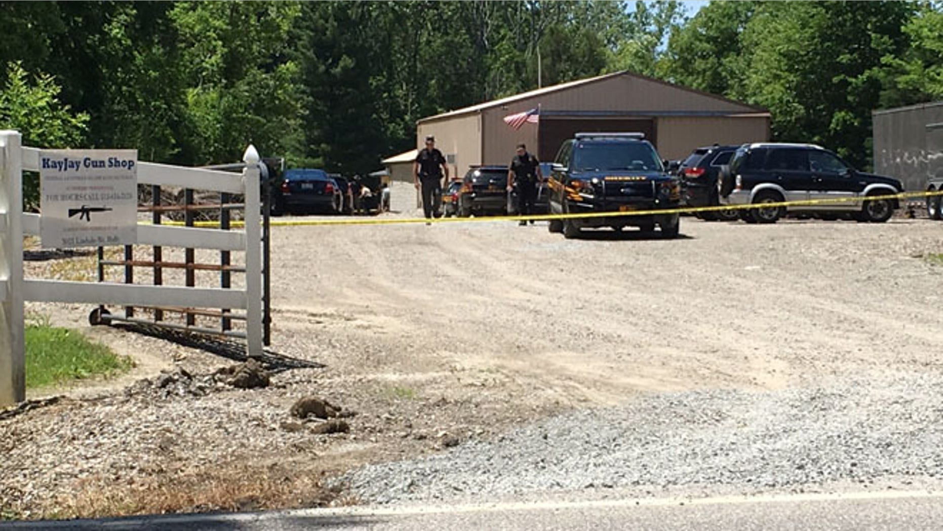 Sheriff's deputies investigate accidental shooting at KayJay Gun Shop in Amelia, Ohio. (FOX19 NOW/ Chris Waldmann)