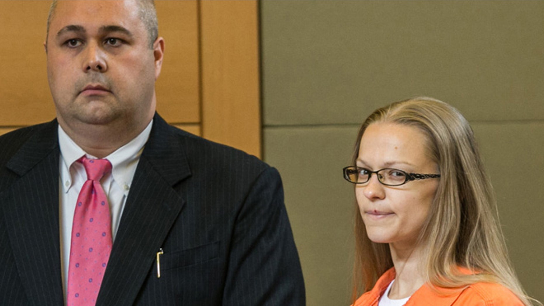 May 13: Angelika Graswald, right, stands in court with Michael Archer a forensic scientist, as her attorneys ask for bail and to unseal the indictment against her during a hearing, in Goshen, N.Y.