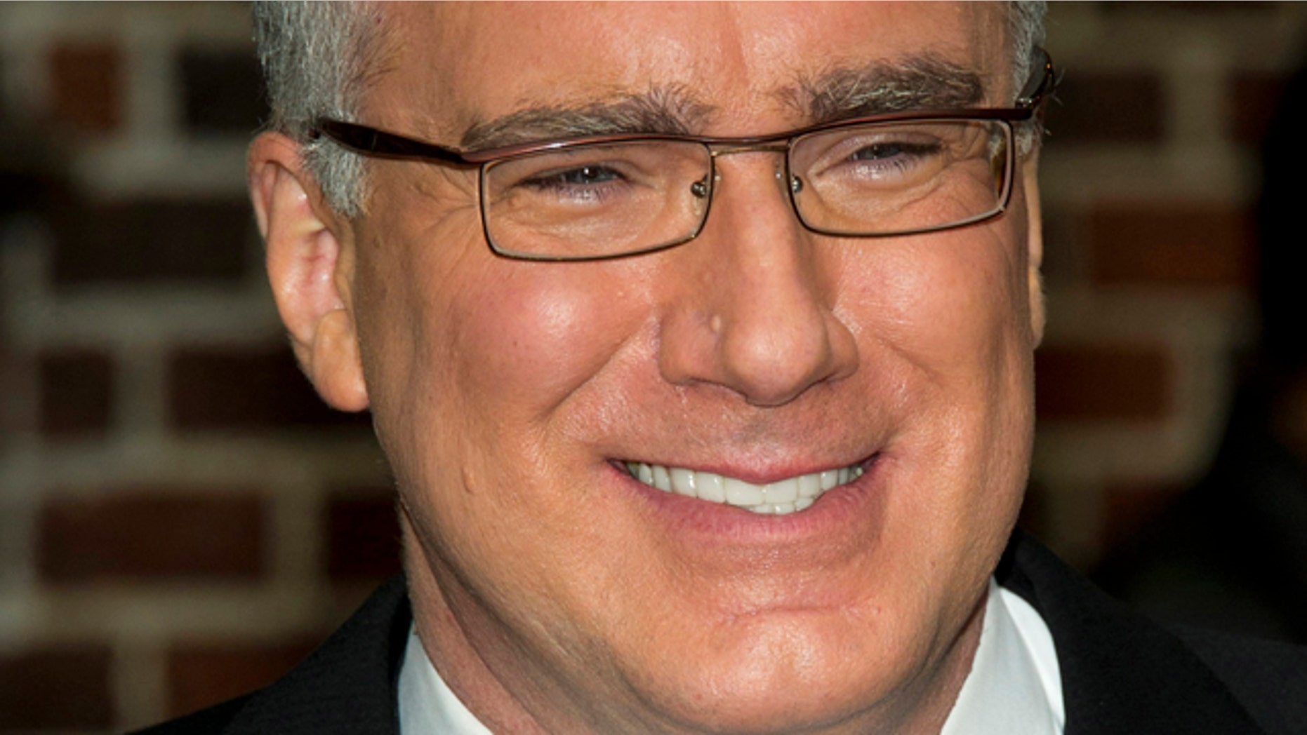 FILE - In this Oct. 24, 2011 file photo, political pundit Keith Olbermann leaves a taping of the 'Late Show with David Letterman' in New York.