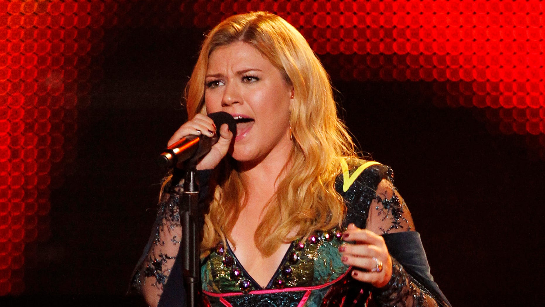 December 16, 2012. Kelly Clarkson performs during the VH1 Divas show in Los Angeles.