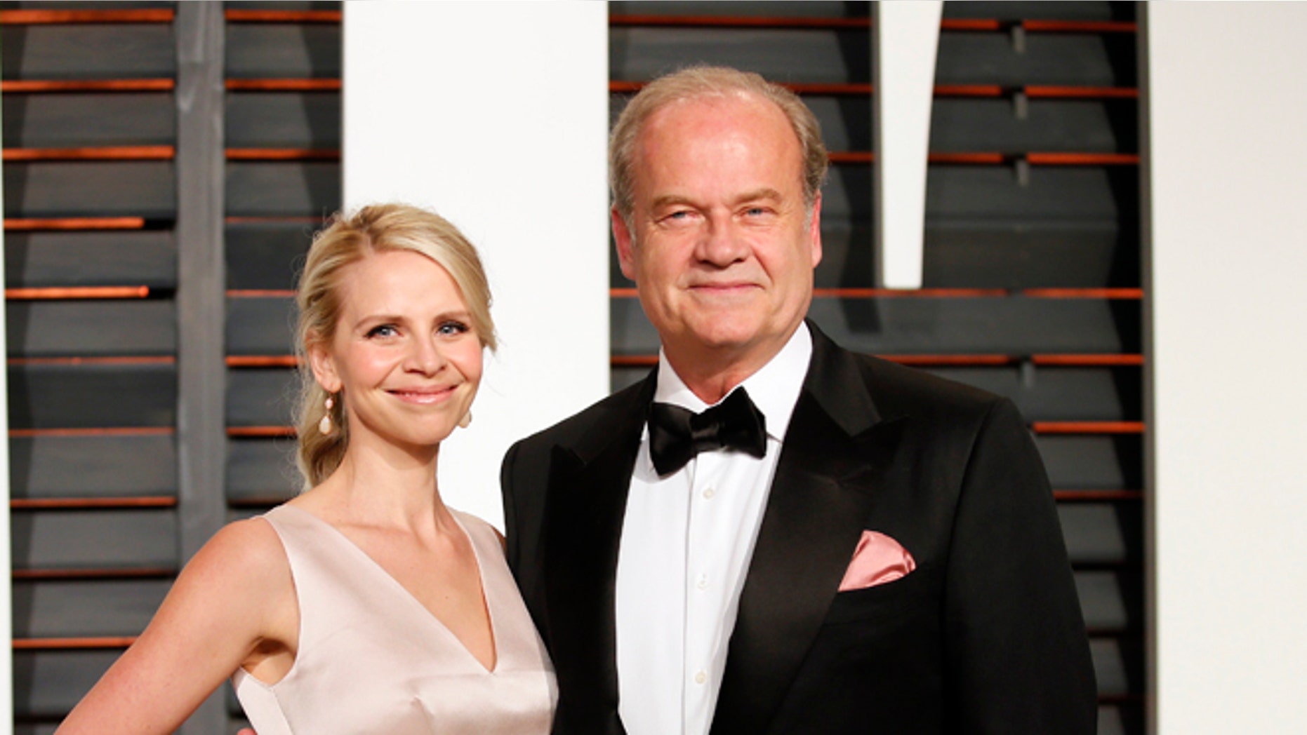 February 22, 2015. Actor Kelsey Grammer and wife, Kayte Walsh, arrive at the 2015 Vanity Fair Oscar Party in Beverly Hills, California.