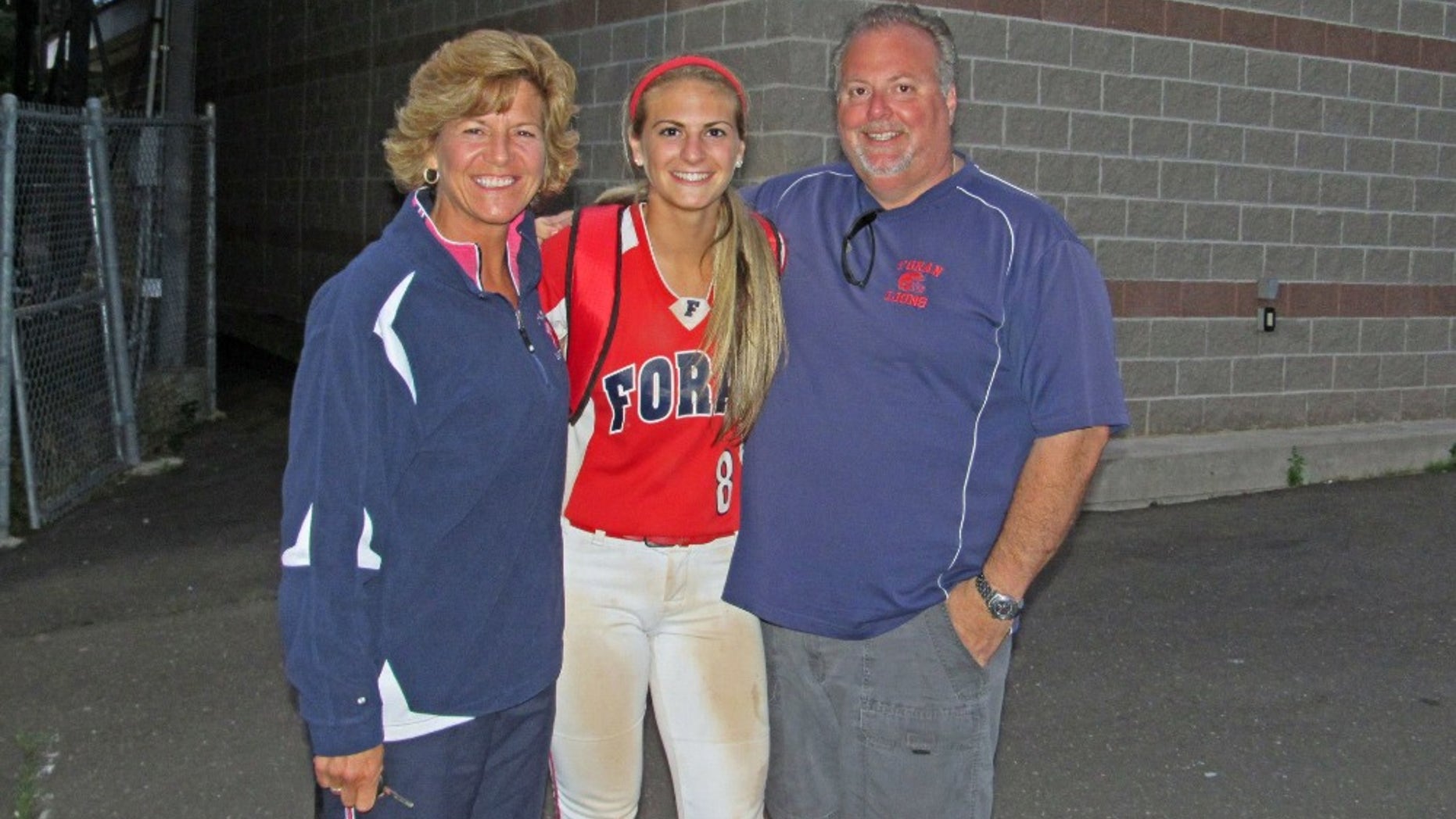 Danielle Kemp, pictured center, was diagnosed with an inoperable brain tumor.
