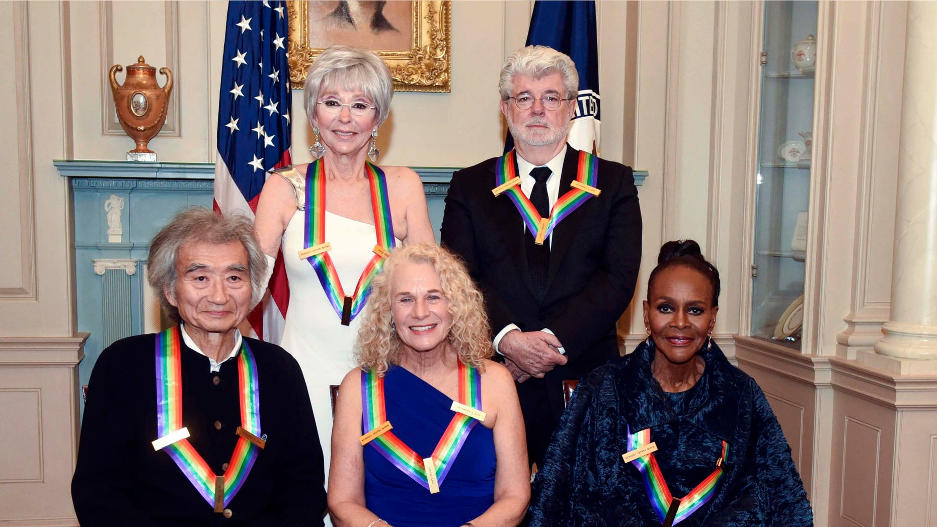 Dec 5, 2015. The 2015 Kennedy Center Honorees, from left, Seiji Ozawa, Rita Moreno, Carole King, George Lucas and Cicely Tyson pose for a group photo following the State Department Dinner for the Kennedy Center Honors in Washington.