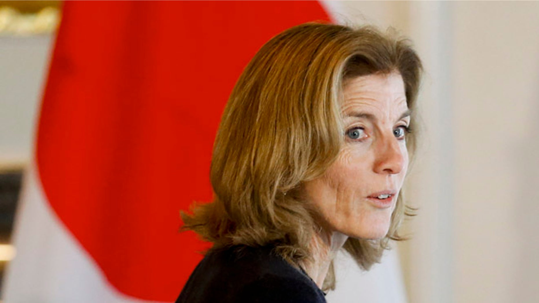 Nov. 14, 2015: U.S. Ambassador Caroline Kennedy walks past the Japanese flag during a reception of Major League Baseball (MLB) players at the ambassador's residence in Tokyo. (Reuters)
