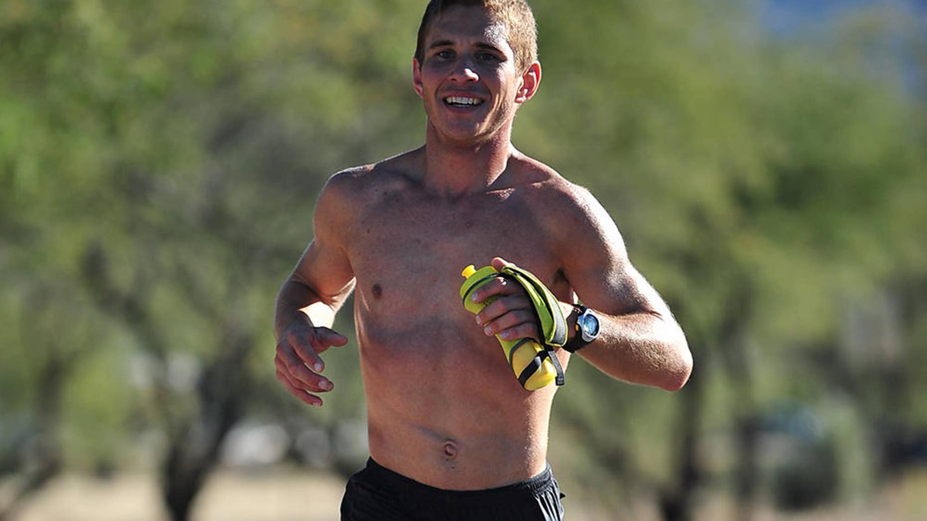 Police officer Kent Green on his way to a 2:54:45 personal best at the 2014 Tuscon Marathon.