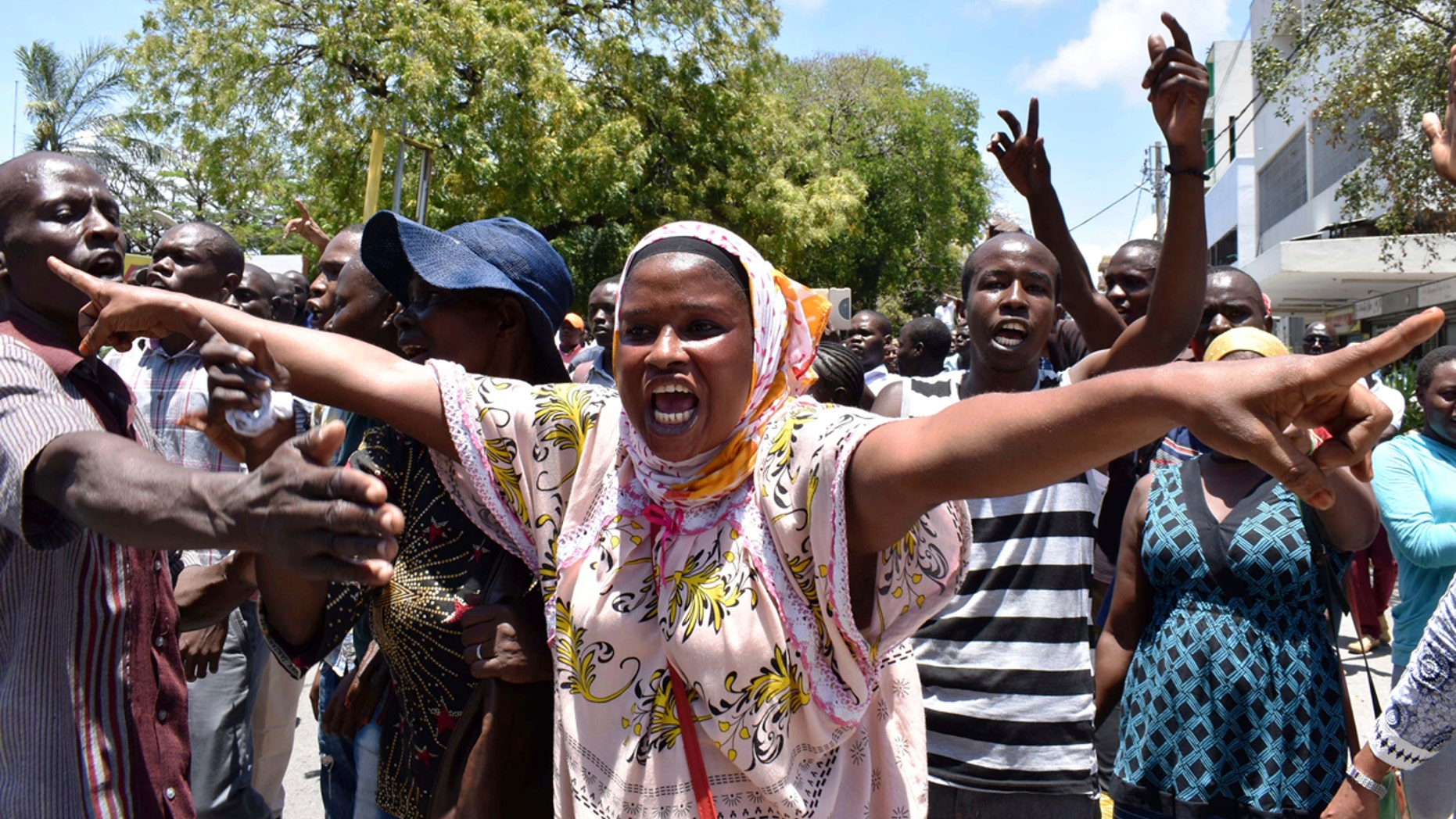 A National Super Alliance supporter shouts slogans after police prevented them from going to the IEBC offices in Mombasa, Kenya, Monday, Oct. 2, 2017.
