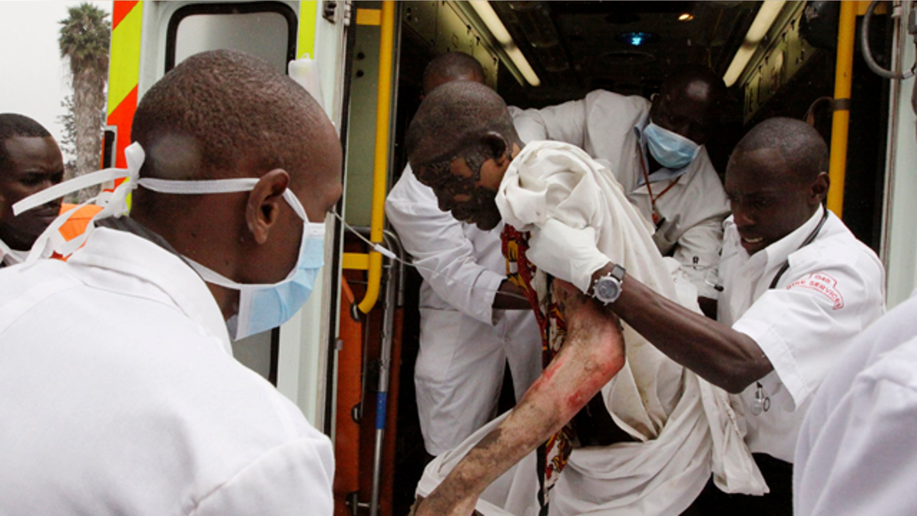Sept. 12: A person injured in a gasoline pipeline incident is brought to Kenyatta National Hospital in Nairobi, Kenya. A local official says at least 61 bodies have been recovered after an explosion of a gasoline pipeline running through a slum in Kenya's capital.
