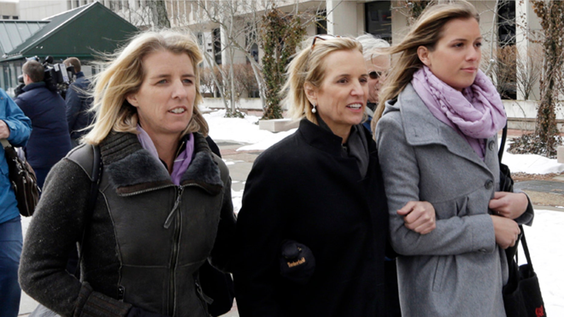Feb. 26, 2014: Kerry Kennedy, center, leaves Westchester County courthouse with family in White Plains, N.Y. Kennedy testified Wednesday that she did not knowingly take a sleeping pill on the day her Lexus swerved into a tractor-trailer on a suburban New York highway.