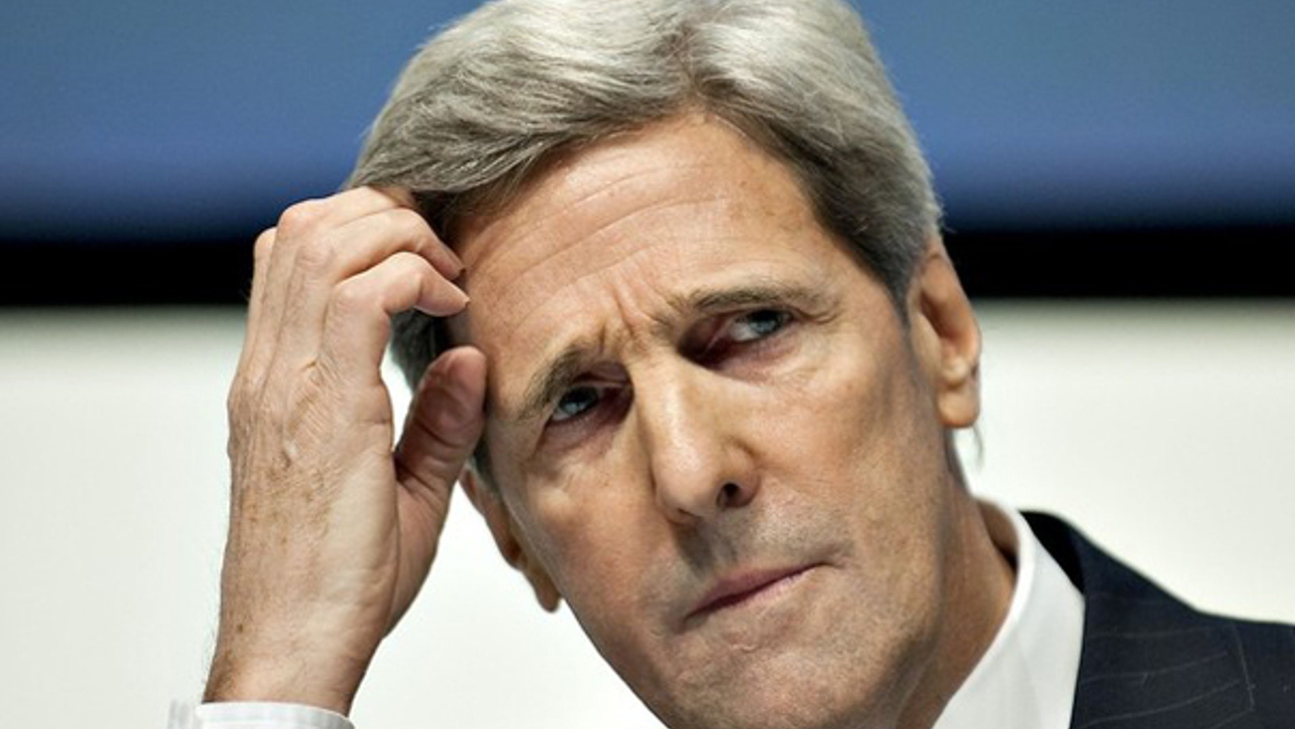 Sen. John Kerry reacts at a news conference at the U.N. Climate Change Conference in Copenhagen Dec. 16. (Reuters Photo)