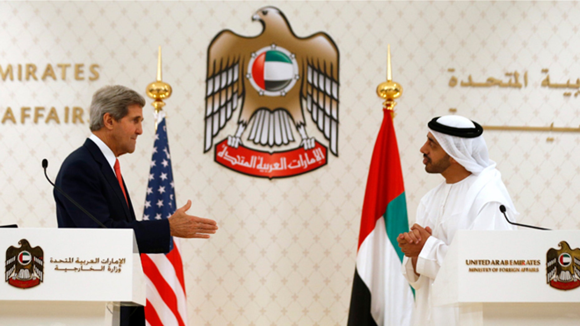 Nov. 11, 2013: U.S. Secretary of State John Kerry reaches out to shake hands with U.A.E. Foreign Minister Abdullah bin Zayed Al Nahyan in Abu Dhabi. The U.A.E. is one of the biggest buyers of U.S. arms.