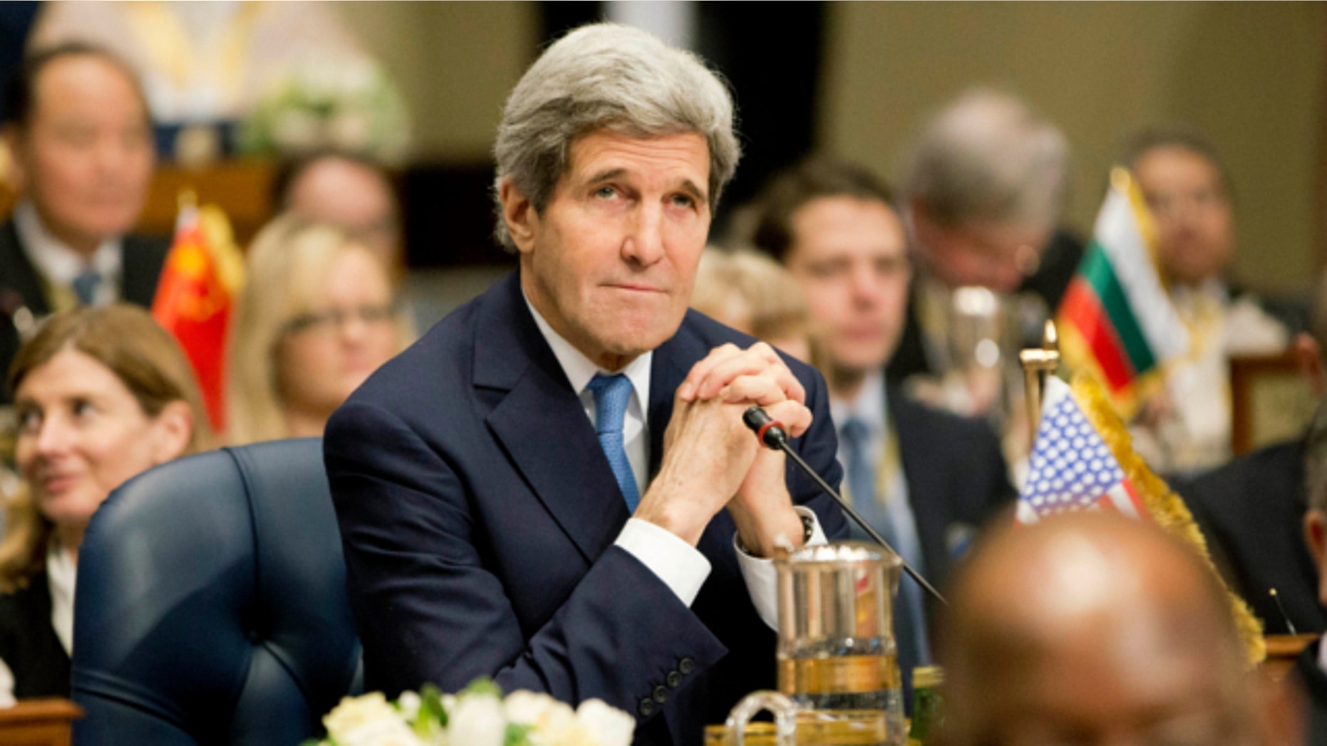 Jan. 15, 2014: Secretary of State John Kerry attends the opening session of the Syria Donors' Conference at Bayan Palace Liberation Hall in Kuwait.