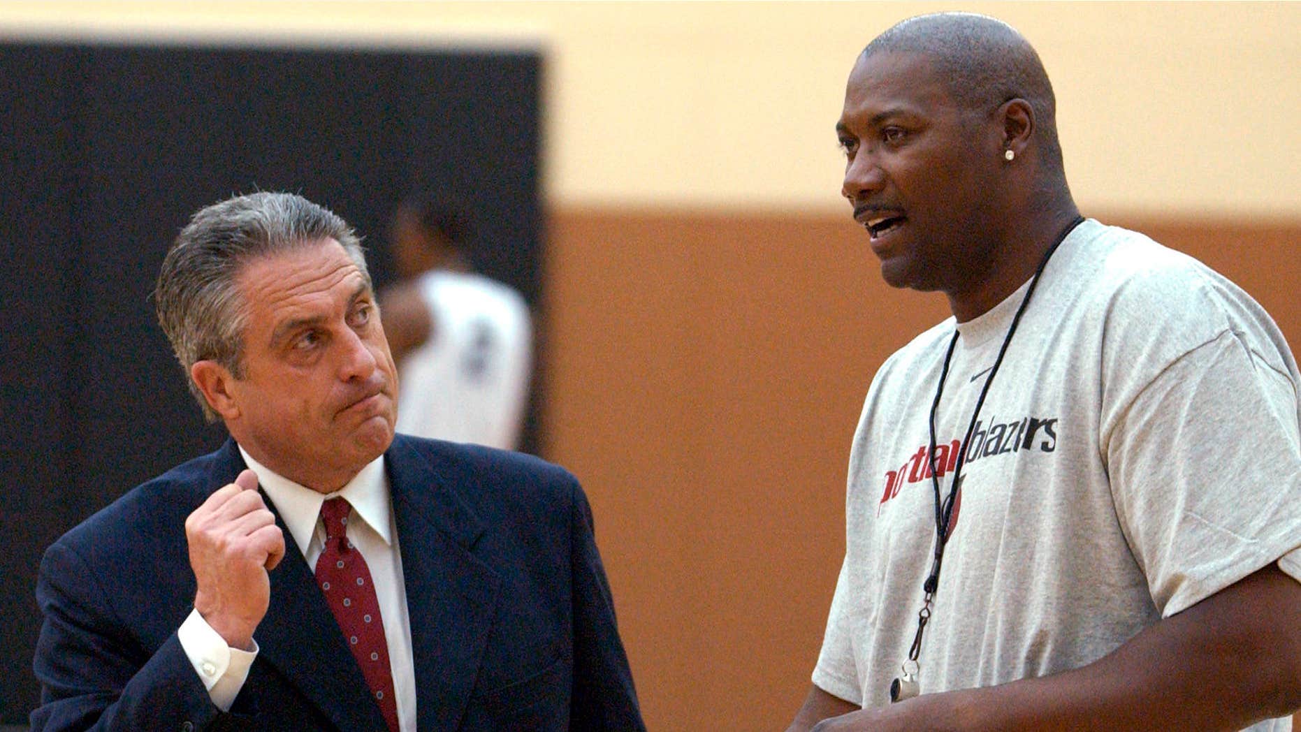 July 16, 2003: Portland Trail Blazers general manager John Nash, left, chats with assistant coach Jerome Kersey after the NBA basketball team's practice in Tualatin, Ore.