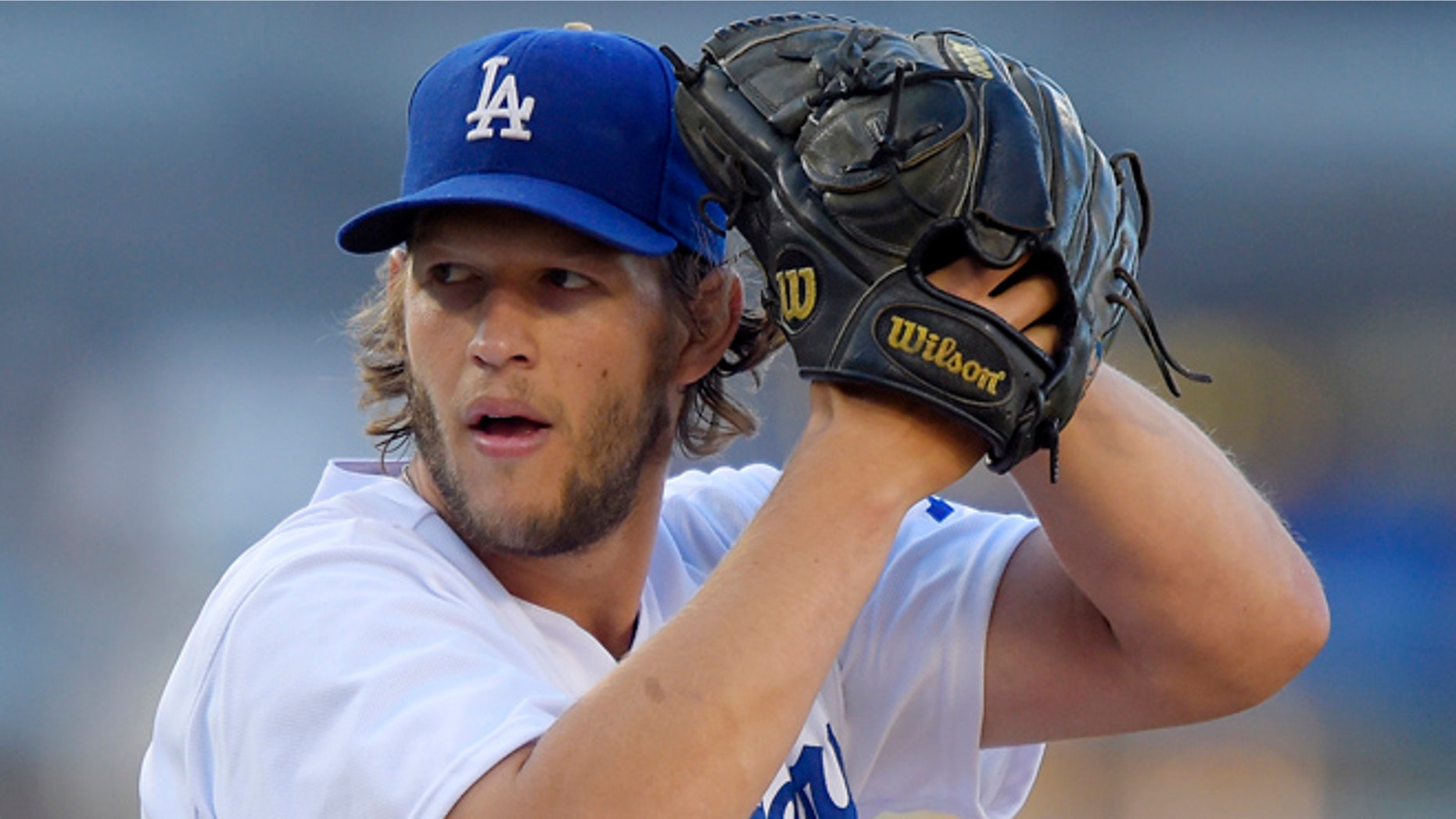 Aug. 16, 2014: Los Angeles Dodgers pitcher Clayton Kershaw winds up during a baseball game against the Milwaukee Brewers in Los Angeles.