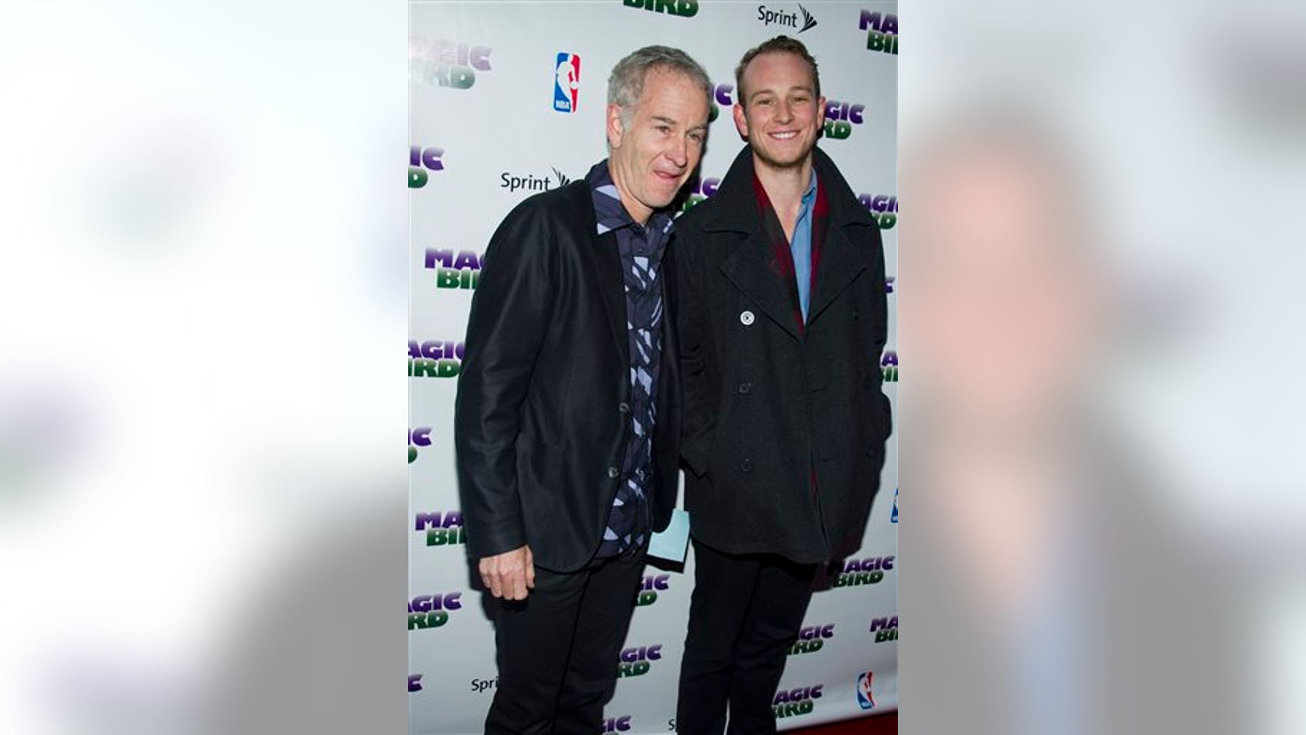In this April 11, 2012 file photo, John McEnroe and his son Kevin arrive for the opening night performance of the Broadway play "Magic/Bird" in New York. Kevin McEnroe was arrested Tuesday, during an alleged drug sale.