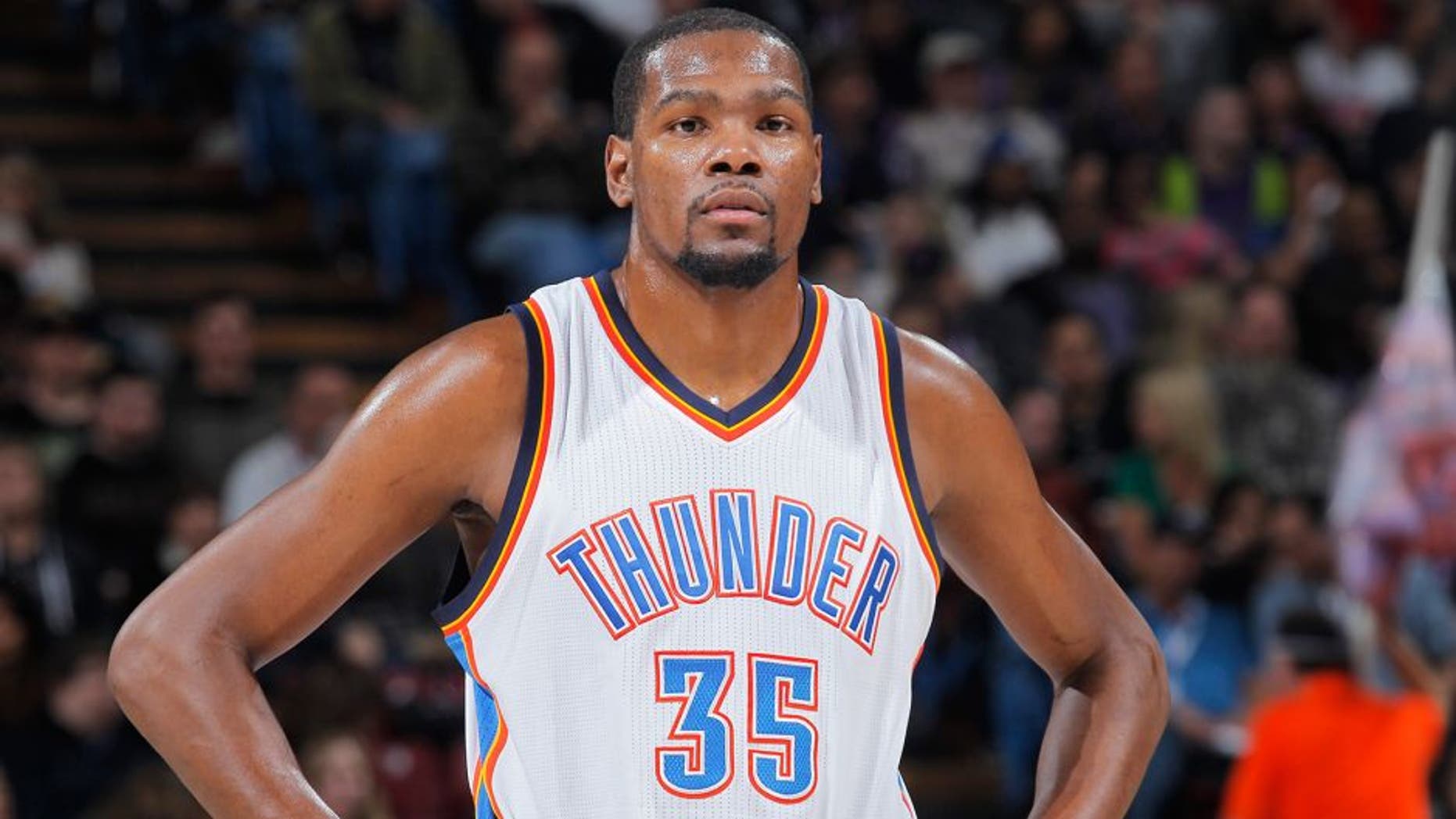 SACRAMENTO, CA - DECEMBER 16: Kevin Durant #35 of the Oklahoma City Thunder looks on during the game against the Sacramento Kings on December 16, 2014 at Sleep Train Arena in Sacramento, California. NOTE TO USER: User expressly acknowledges and agrees that, by downloading and or using this photograph, User is consenting to the terms and conditions of the Getty Images Agreement. Mandatory Copyright Notice: Copyright 2014 NBAE (Photo by Rocky Widner/NBAE via Getty Images)