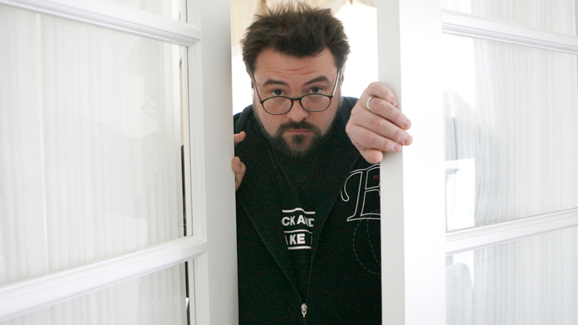 Kevin Smith, director and writer of the movie "Zack and Miri Make a Porno", poses in Los Angeles October 19, 2008.