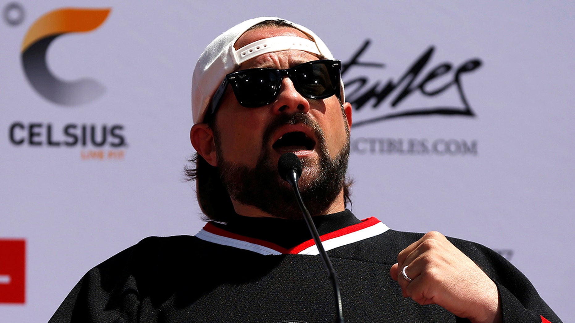 Director Kevin Smith speaks at a ceremony for Marvel co-creator Stan Lee to place his handprints, footprints and signature in cement in the forecourt of the TCL Chinese theatre in Los Angeles, California, U.S., July 18, 2017. REUTERS/Mario Anzuoni - RC1FA799CC00