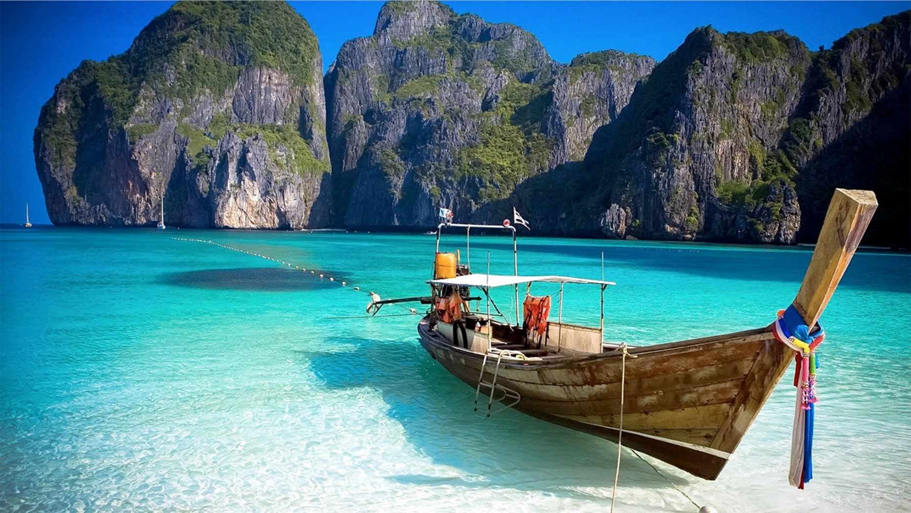 The family got a mysterious phone before police tracked him down to Thailand's island of Ko Phi Phi.