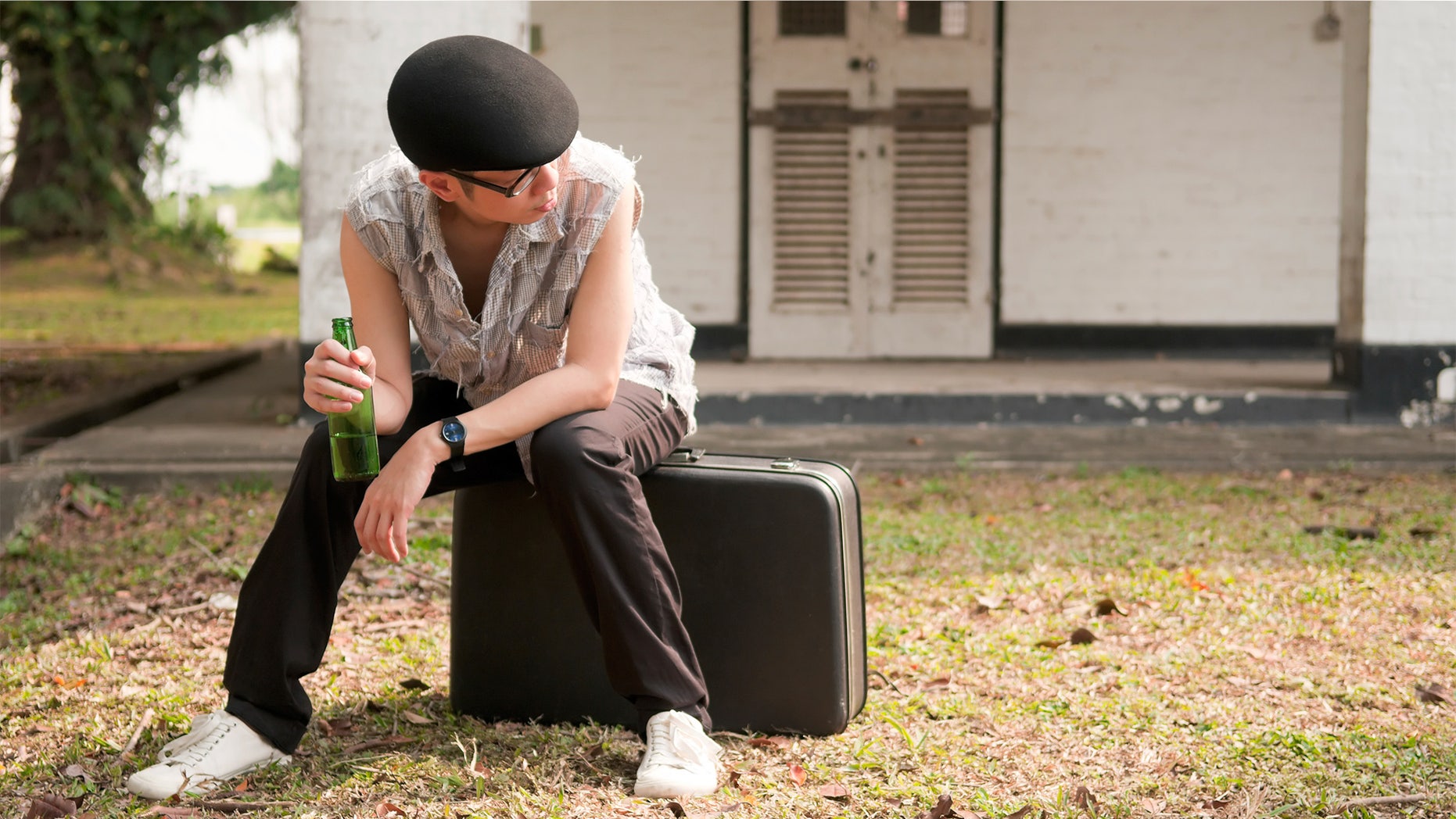 kicked-out-suitcase