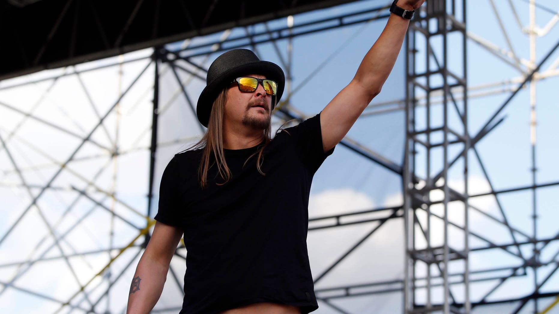Apr 7, 2014; Arlington, TX, USA; Recording artist Kid Rock performs before the championship game of the Final Four in the 2014 NCAA Mens Division I Championship tournament between the Connecticut Huskies and Kentucky Wildcats at AT&T Stadium. Mandatory Credit: Kevin Jairaj-USA TODAY Sports - RTR3KC5Z