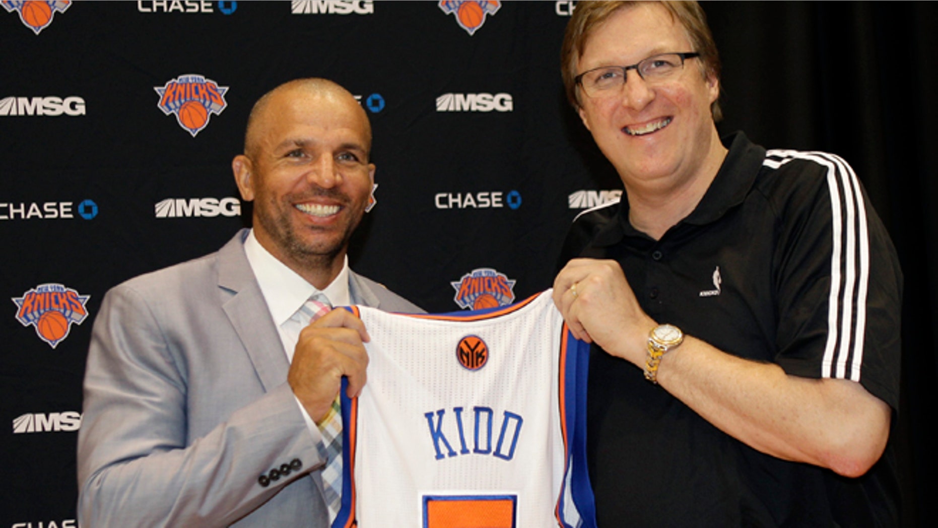 July 12, 2012: New York Knicks executive vice president and general manager Glen Grunwald poses for a photograph with Jason Kidd, one of the Knicks two newest additions, following a news conference at the team's training facility in Tarrytown, N.Y., Thursday, July 12, 2012.