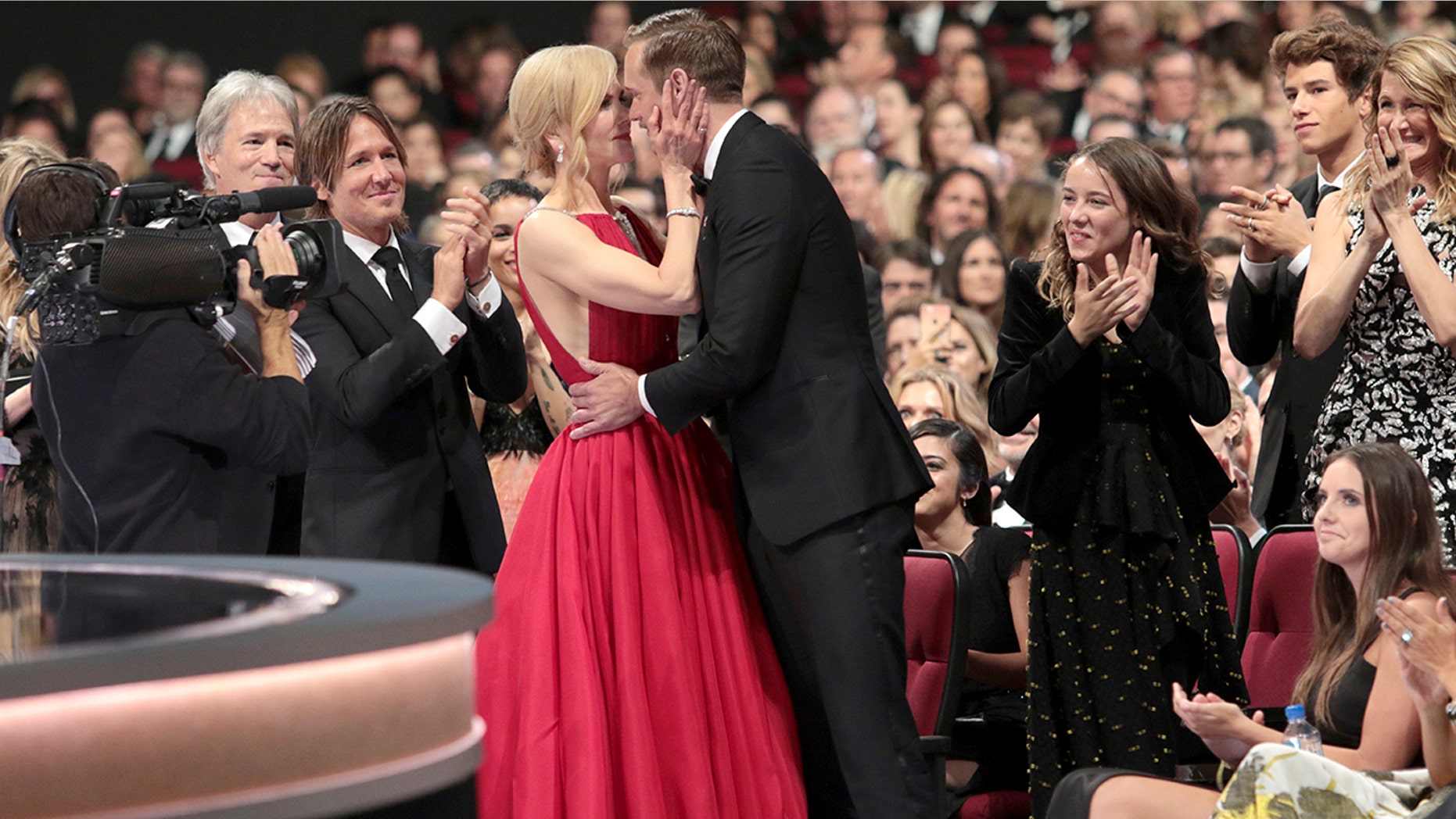 IMAGE DISTRIBUTED FOR THE TELEVISION ACADEMY - Nicole Kidman, left, congratulates Alexander Skarsgard after winning the award for outstanding supporting actor in a limited series or a movie for "Big Little Lies" at the 69th Primetime Emmy Awards on Sunday, Sept. 17, 2017, at the Microsoft Theater in Los Angeles. (Photo by Alex Berliner/Invision for the Television Academy/AP Images)