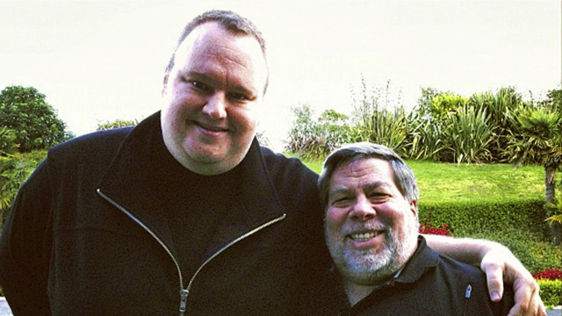 June 27, 2012: Apple cofounder Steve Wozniak, right, and Kim Dotcom, founder of file-sharing site Megaupload, stand together in Auckland, New Zealand. Wozniak said the U.S. piracy case against Dotcom is "hokey" and a threat to Internet innovation.