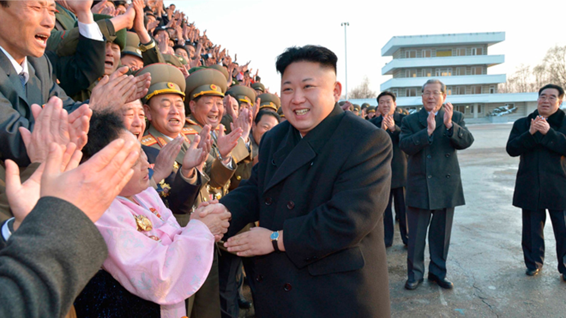 North Korean leader Kim Jong Un visits participants of a national agriculture competition in this undated photo released by North Korea's Korean Central News Agency (KCNA).