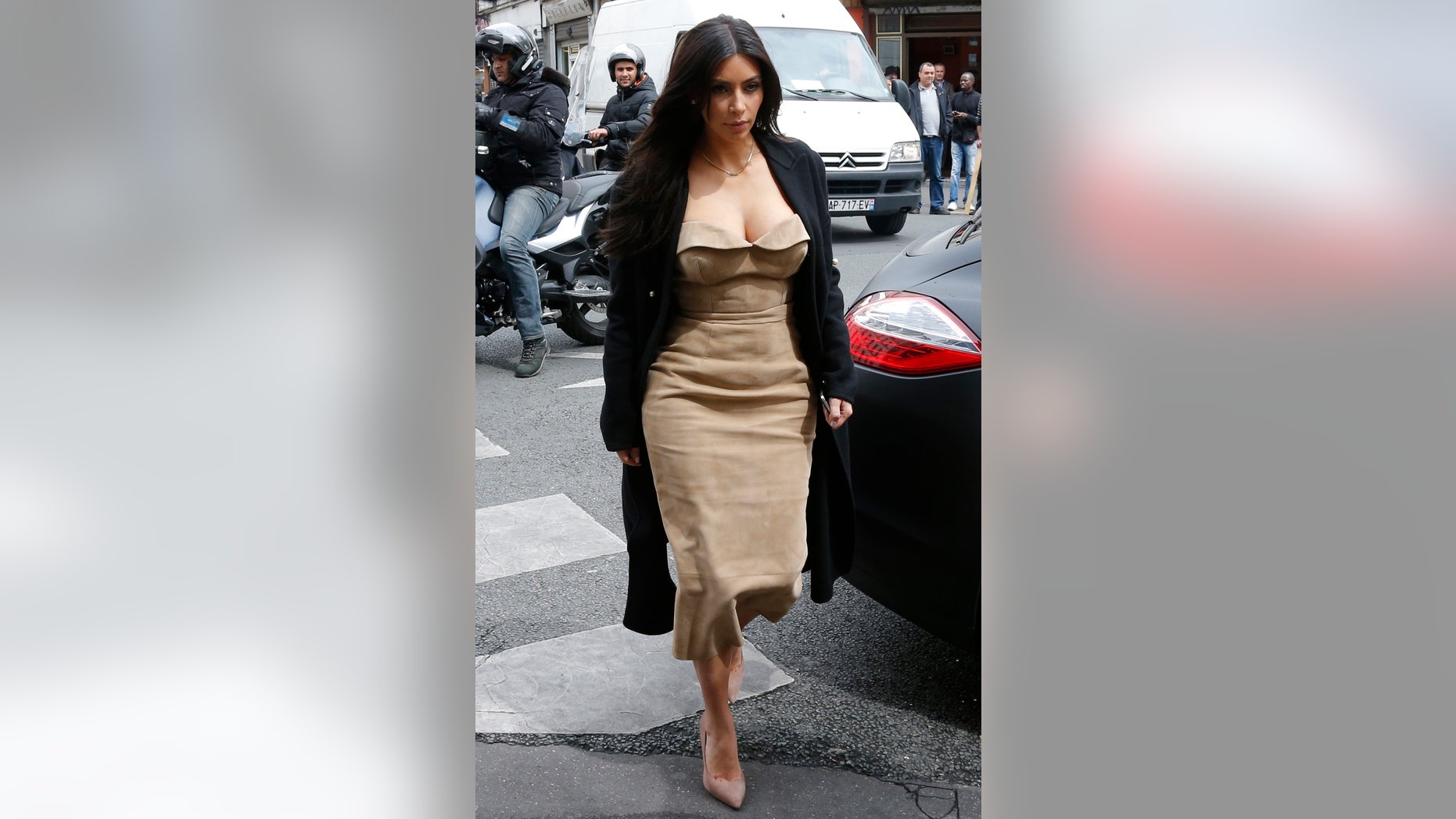 May 21, 2014. Kim Kardashian arrives at a fashion designer workshop in Paris.