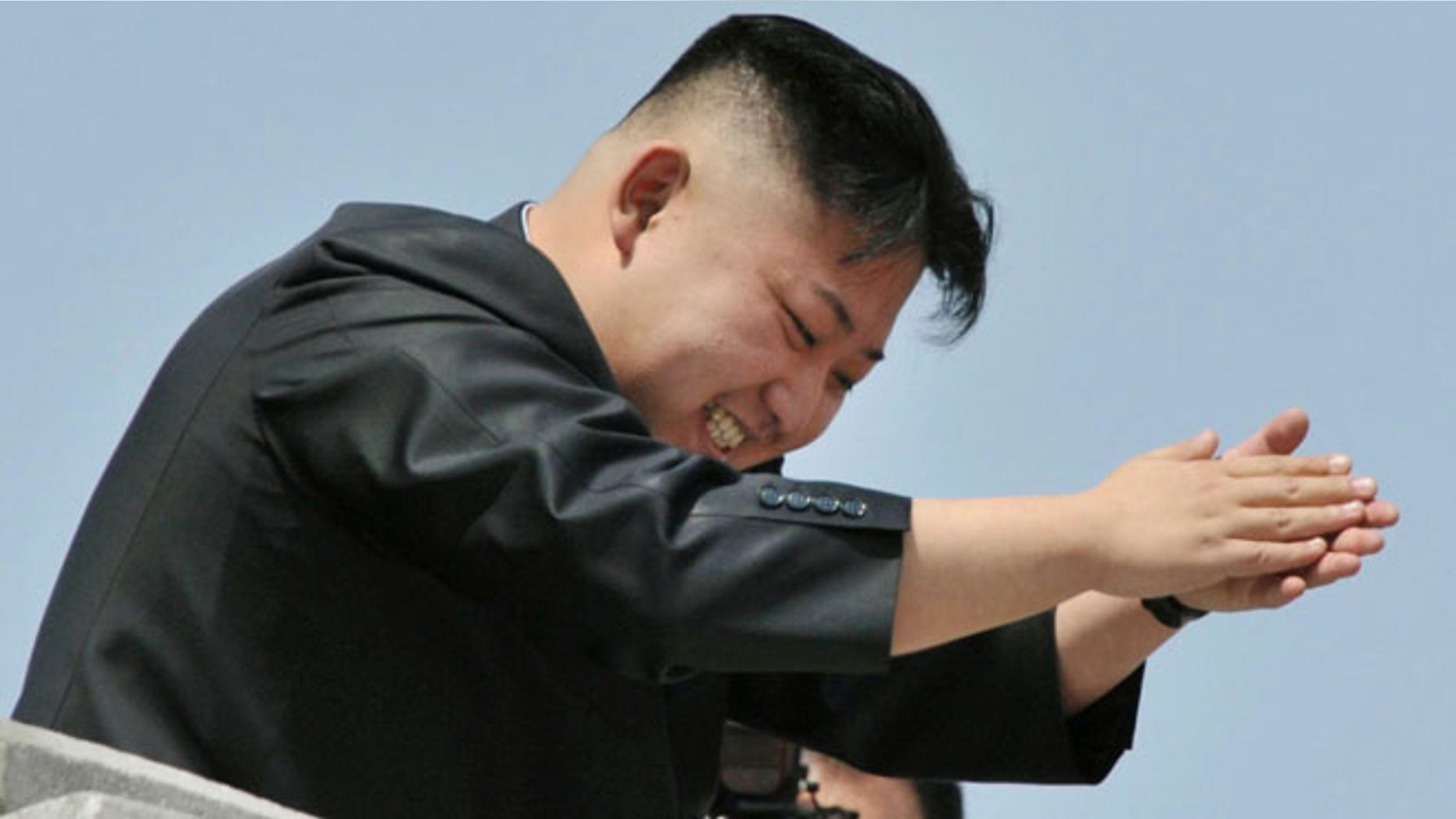 April 15, 2012: North Korean leader Kim Jong-un applauds as he leaves after a mass military parade in Pyongyang.