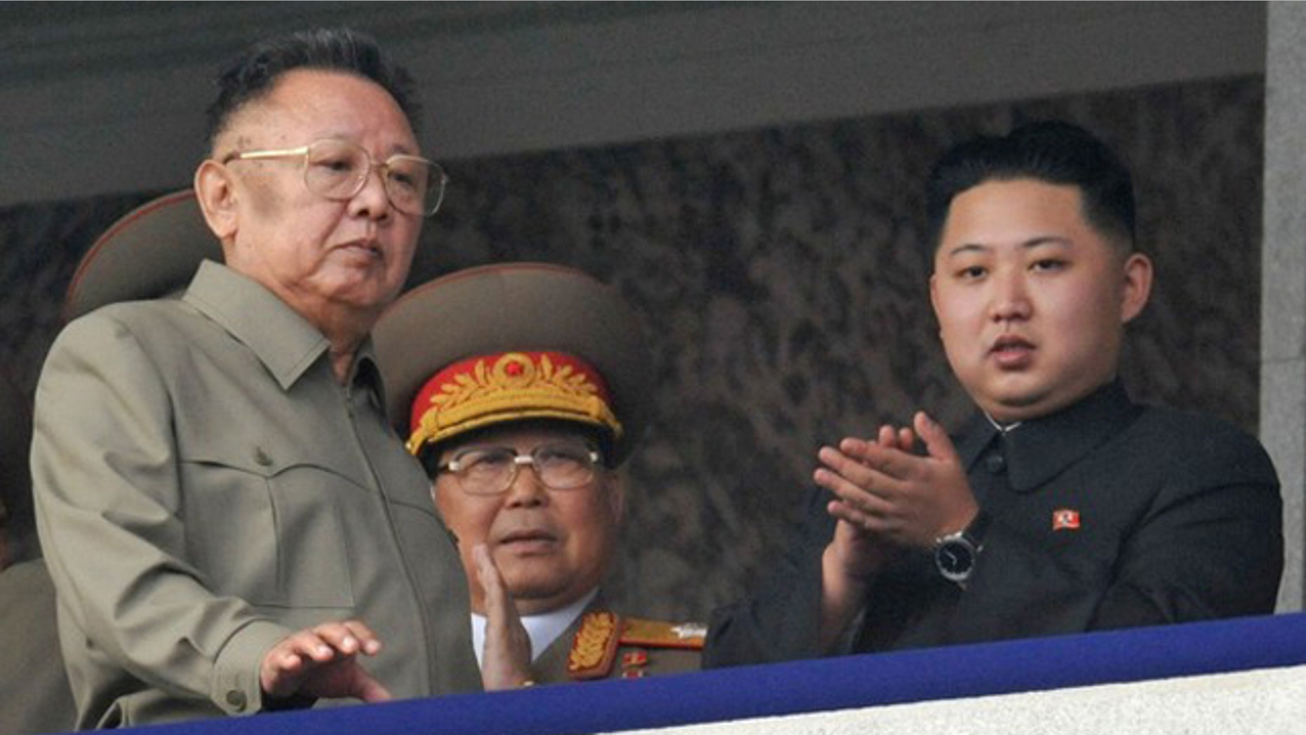 Oct 10: North Korean leader Kim Jong Il, left, walks in front of his youngest son Kim Jong Un as they watch a parade in Pyongyang.
