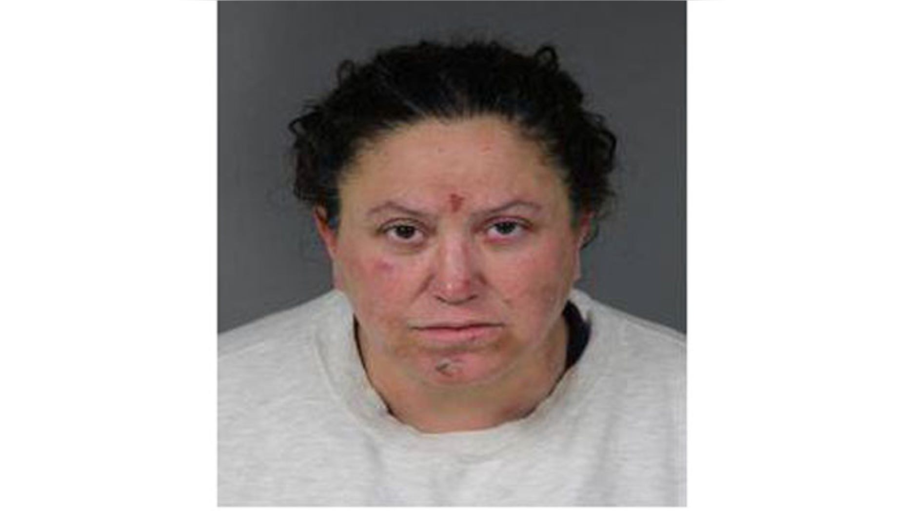 Mug shot for Kimberly Felder, charged with trying to kill her 11-year-old daughter during an exorcism.