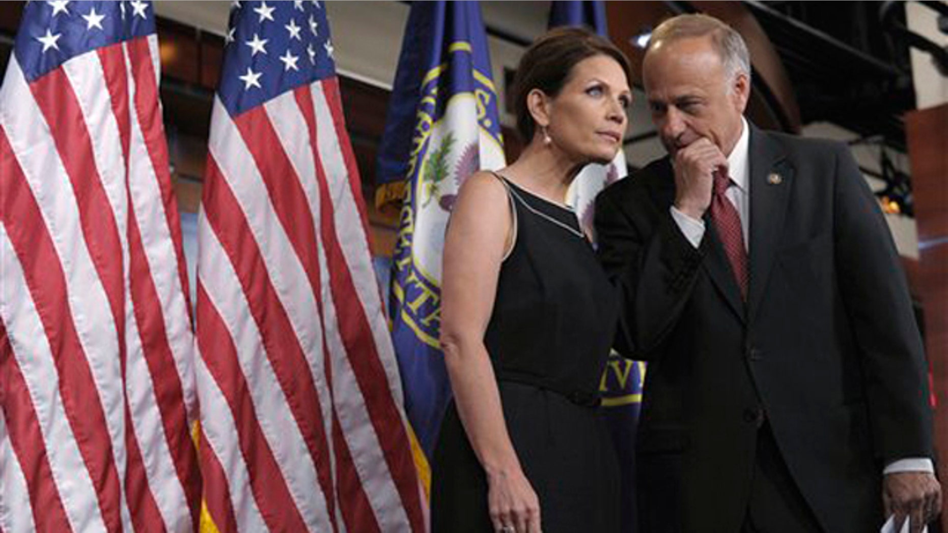 Wednesday: Rep. Michele Bachmann speaks with Rep. Steve King during a news conference on Capitol Hill.