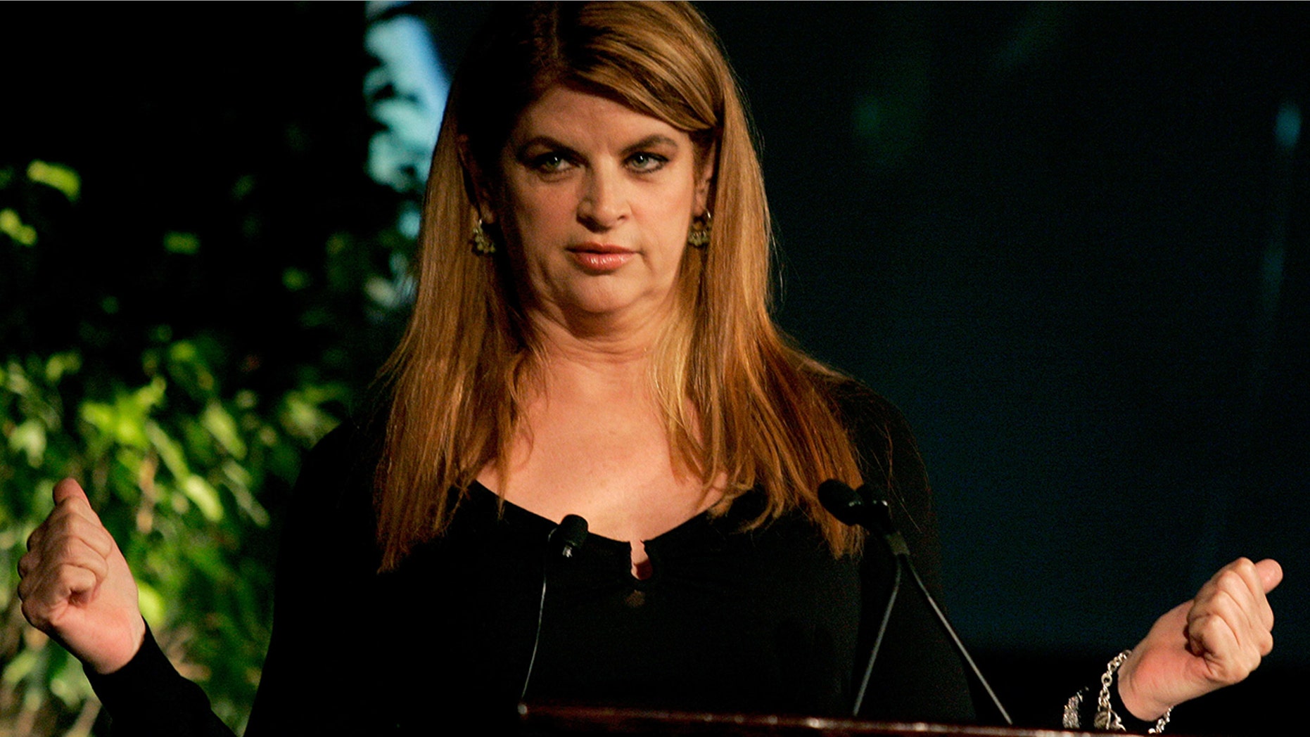 Kirstie Alley gestures while speaking at the Simmons Leadership Conference in Boston, Massachusetts, April 30, 2005. Alley has just written a memoir entitled, "How to Lose Your Ass and Regain Your Life."